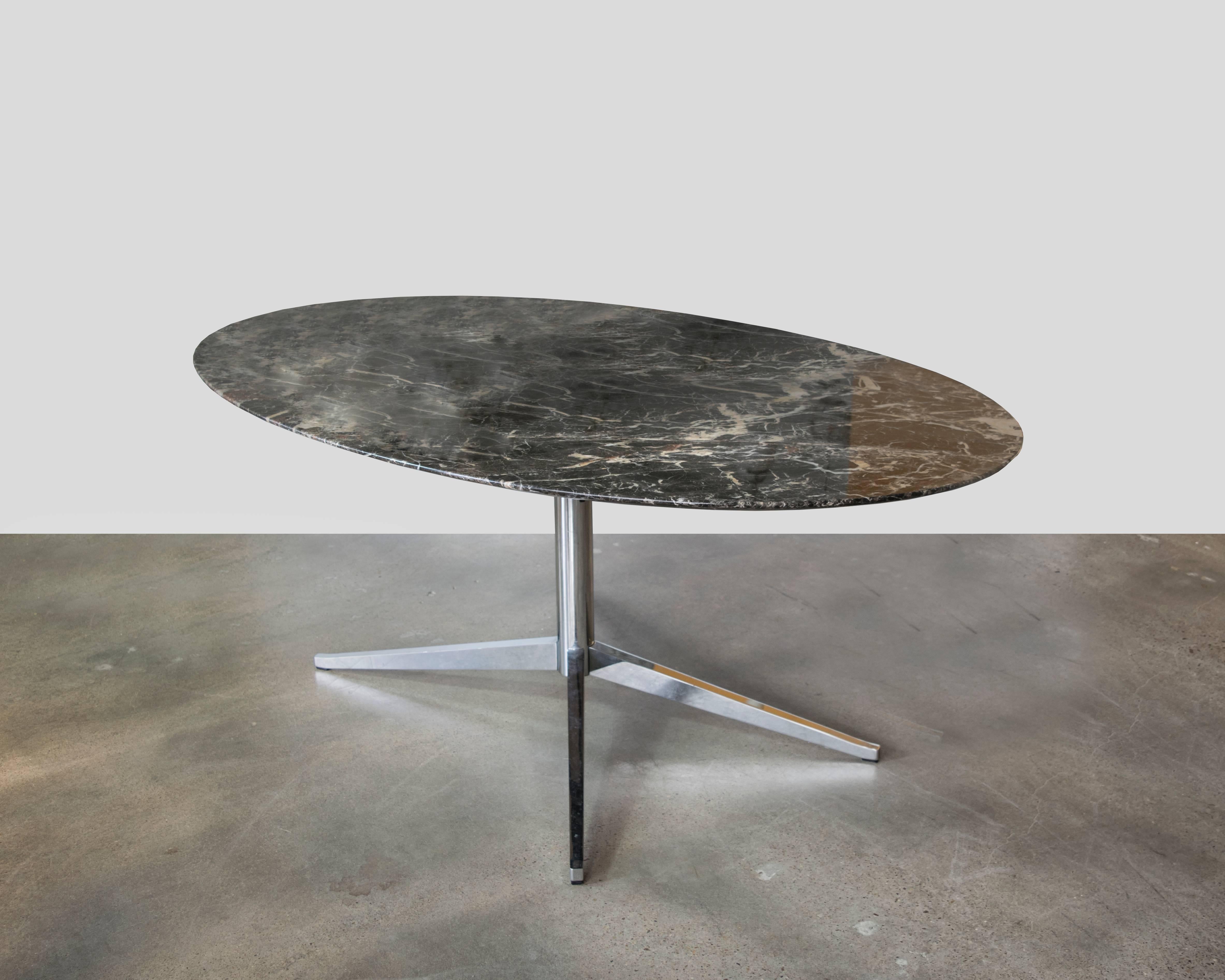 One of the most breathtaking marble tops ever on this classic Florence Knoll dining table or desk with chrome base. The marble is a combination of black, gold, beige and brick colors with intricate veining. An absolute knockout piece.