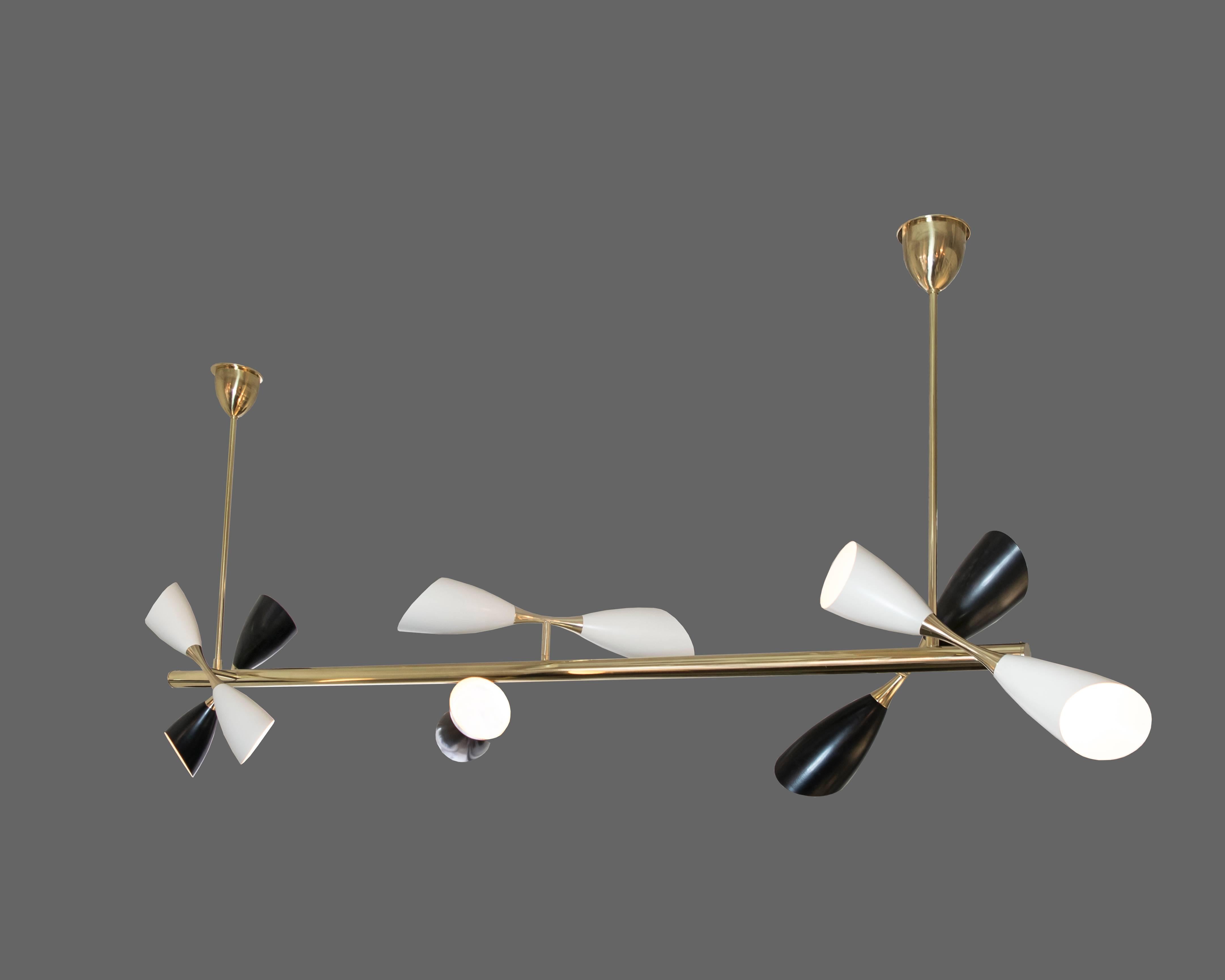 Extremely rare Stilnovo design seven foot long centre post chandelier with six double sided cone lights, three white, three black. This light would look absolutely fantastic over a long dining table.