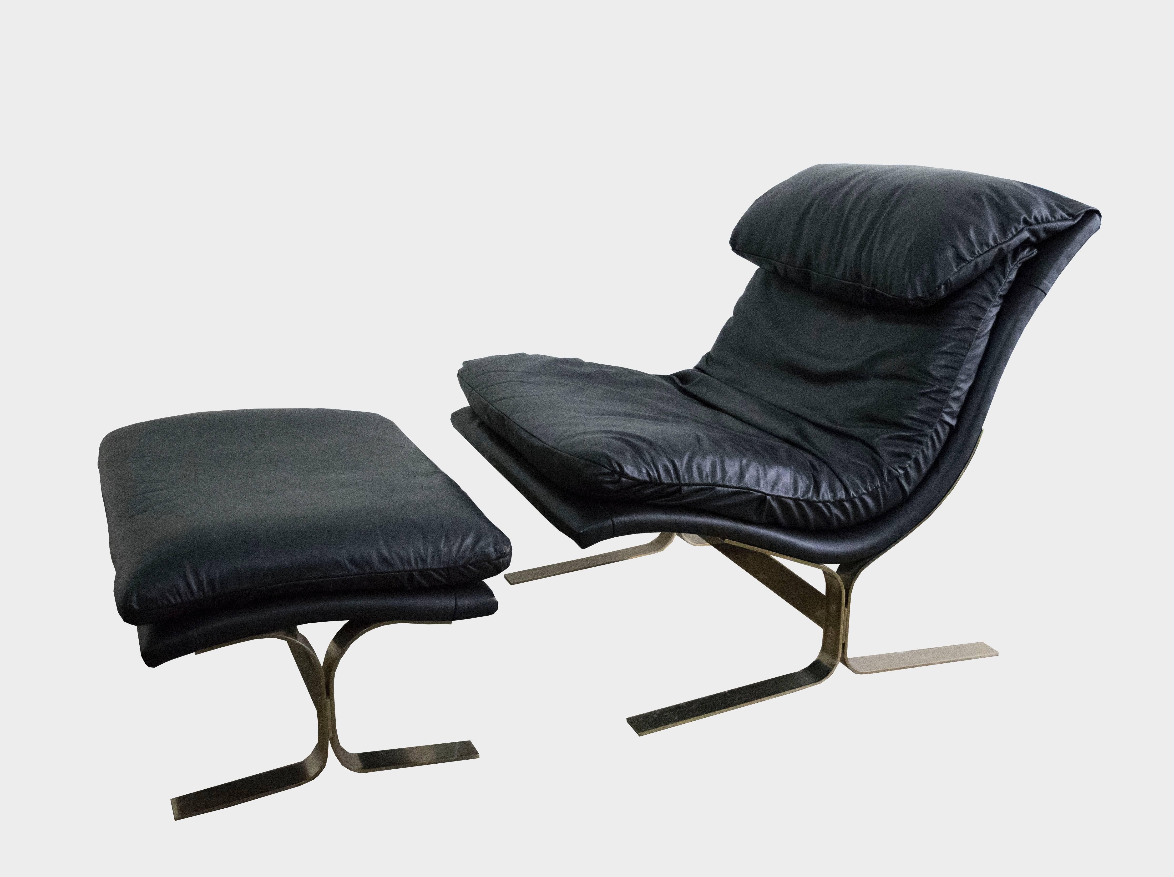 Lounge and ottoman by Lane, in the style of Saporiti.  Brass plated, steel frame in original black leather.