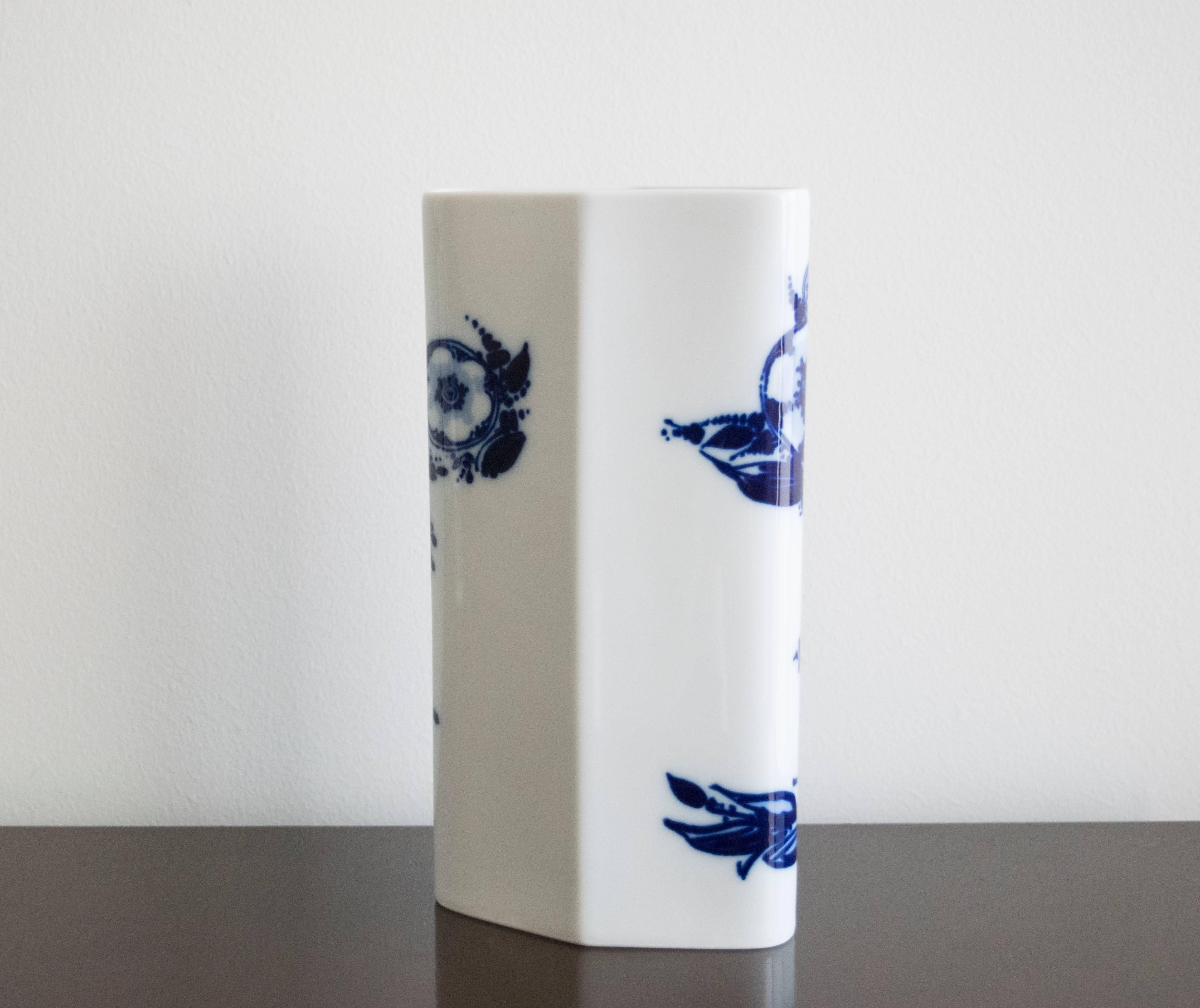 Beautiful hand painted cobalt and white ceramic vase by Danish artist Bjorn Wiinblad.  Signature on back.