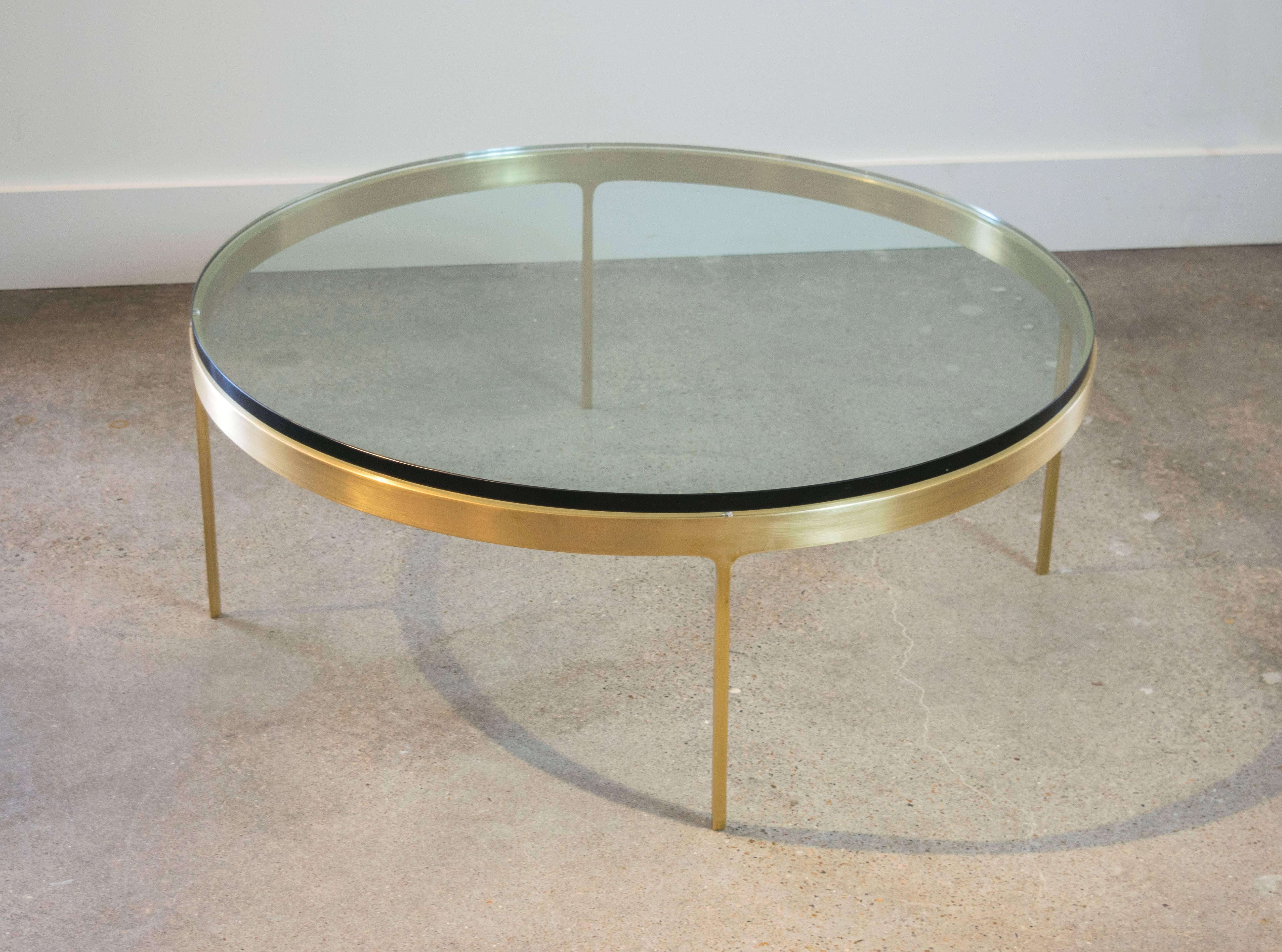 Beautiful iconic Zographos solid brass table with one inch thick glass in excellent condition.