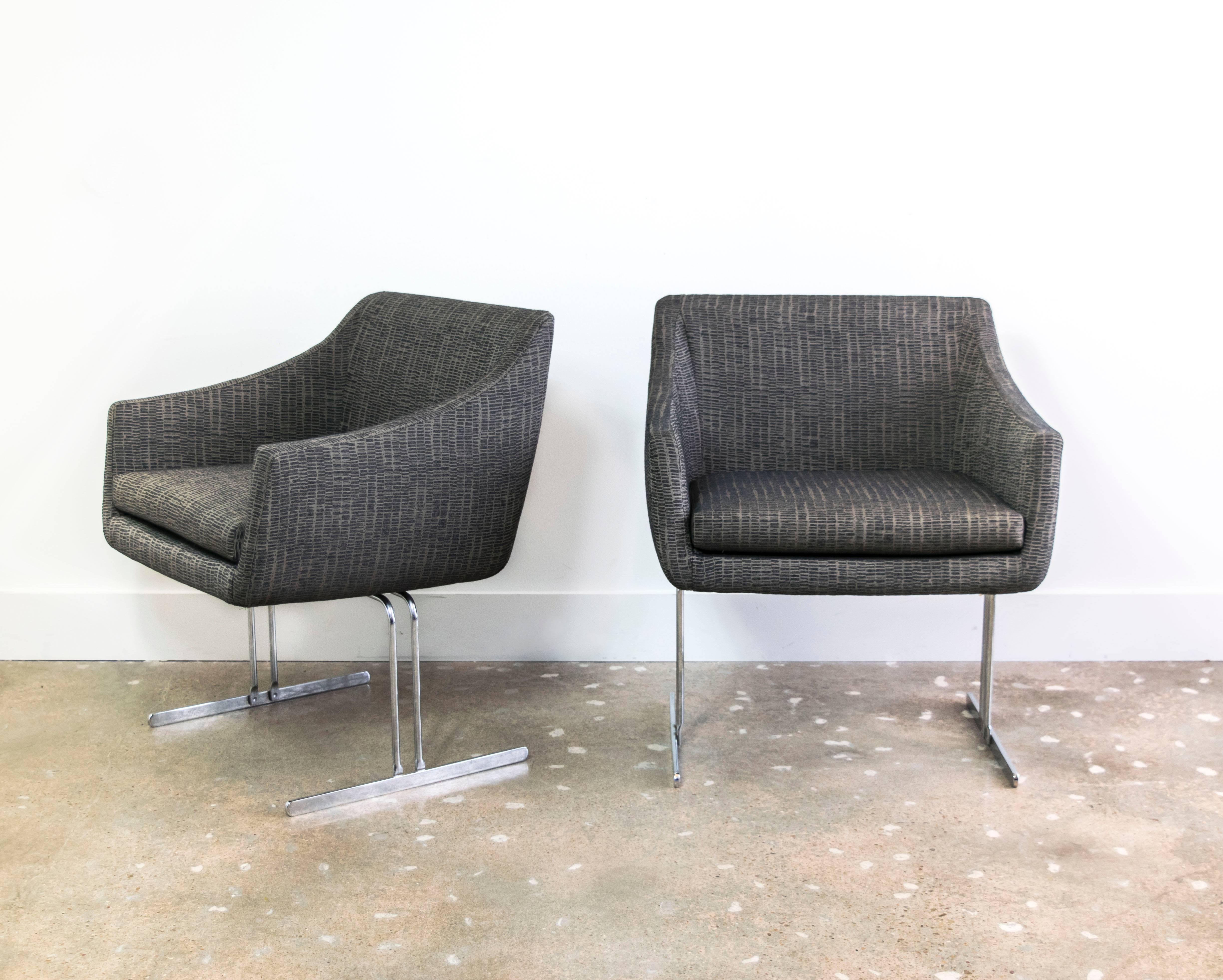 Sleek, minimal Mid Century lounge chairs by Hugh Acton for Vecta recently reupholstered in stunning Knoll Trophy Truffle modern upholstery.