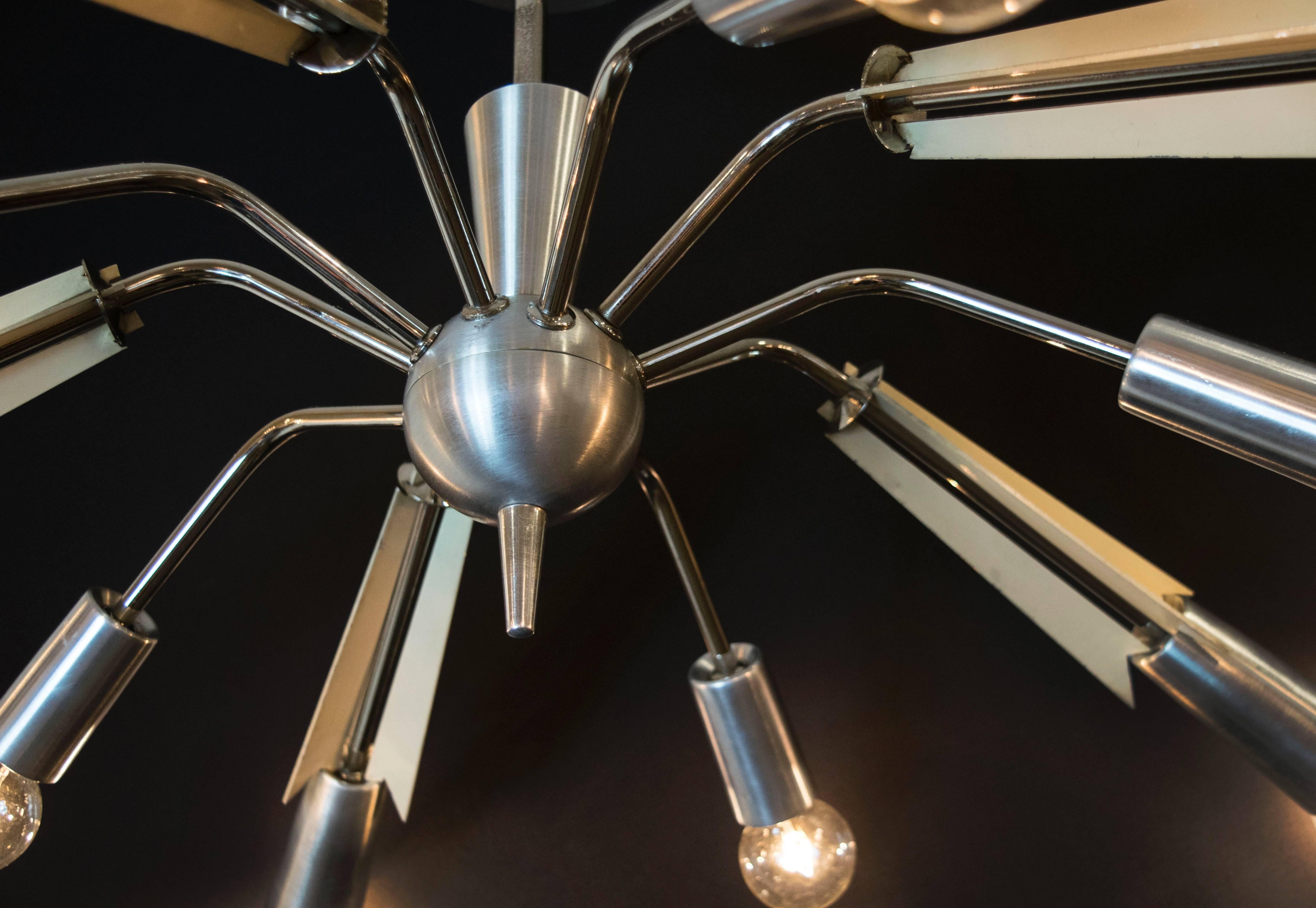 Highly unusual Italian spider chandelier with 10 arms, five longer, five shorter.  The anodized aluminum is in the original color and could possibly be repainted.  Recently rewired.