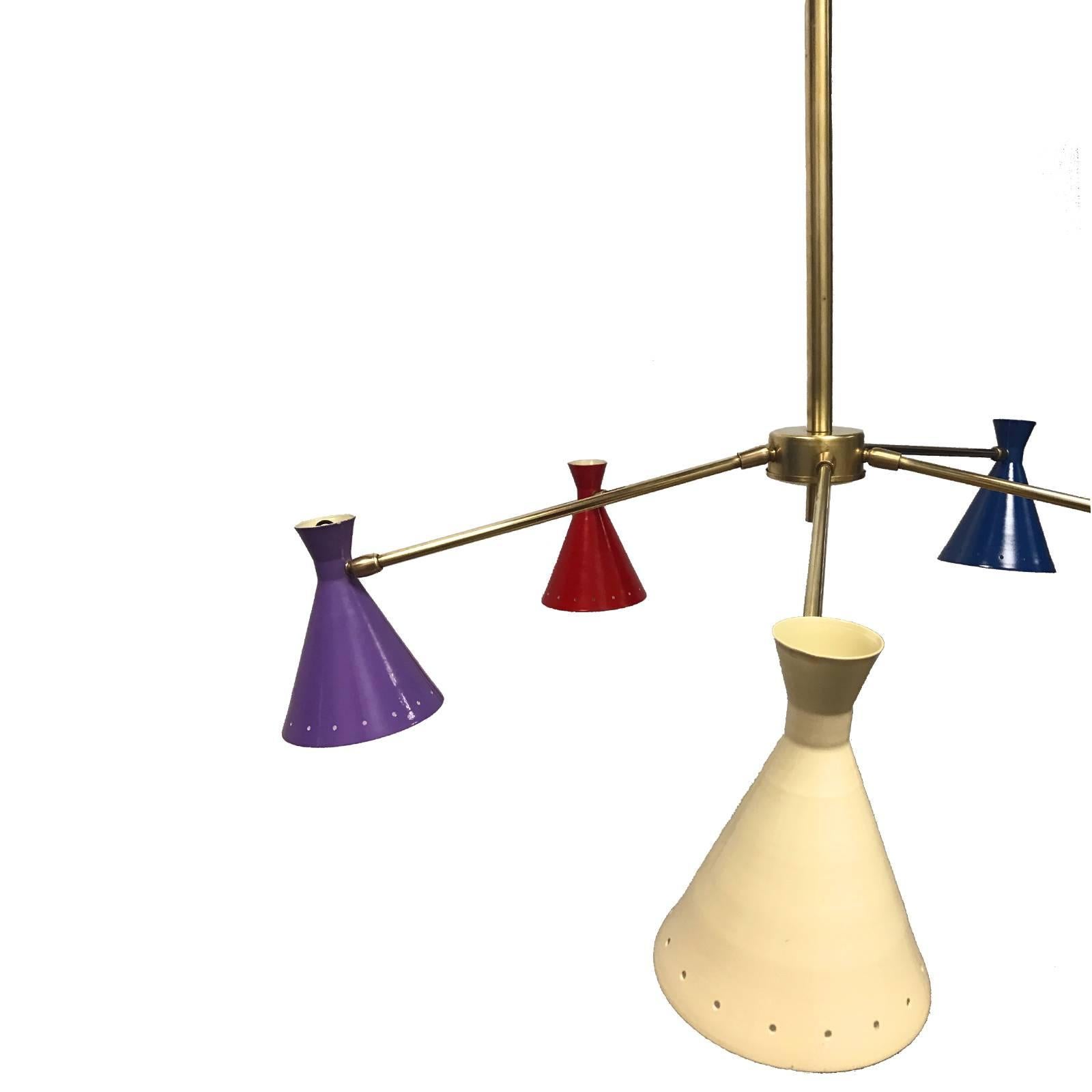 Italian Arteluce 'Monolith' brass and aluminium chandelier with adjustable tole shades. Brass and metal shades have been restored. Colorful and very elegant piece.