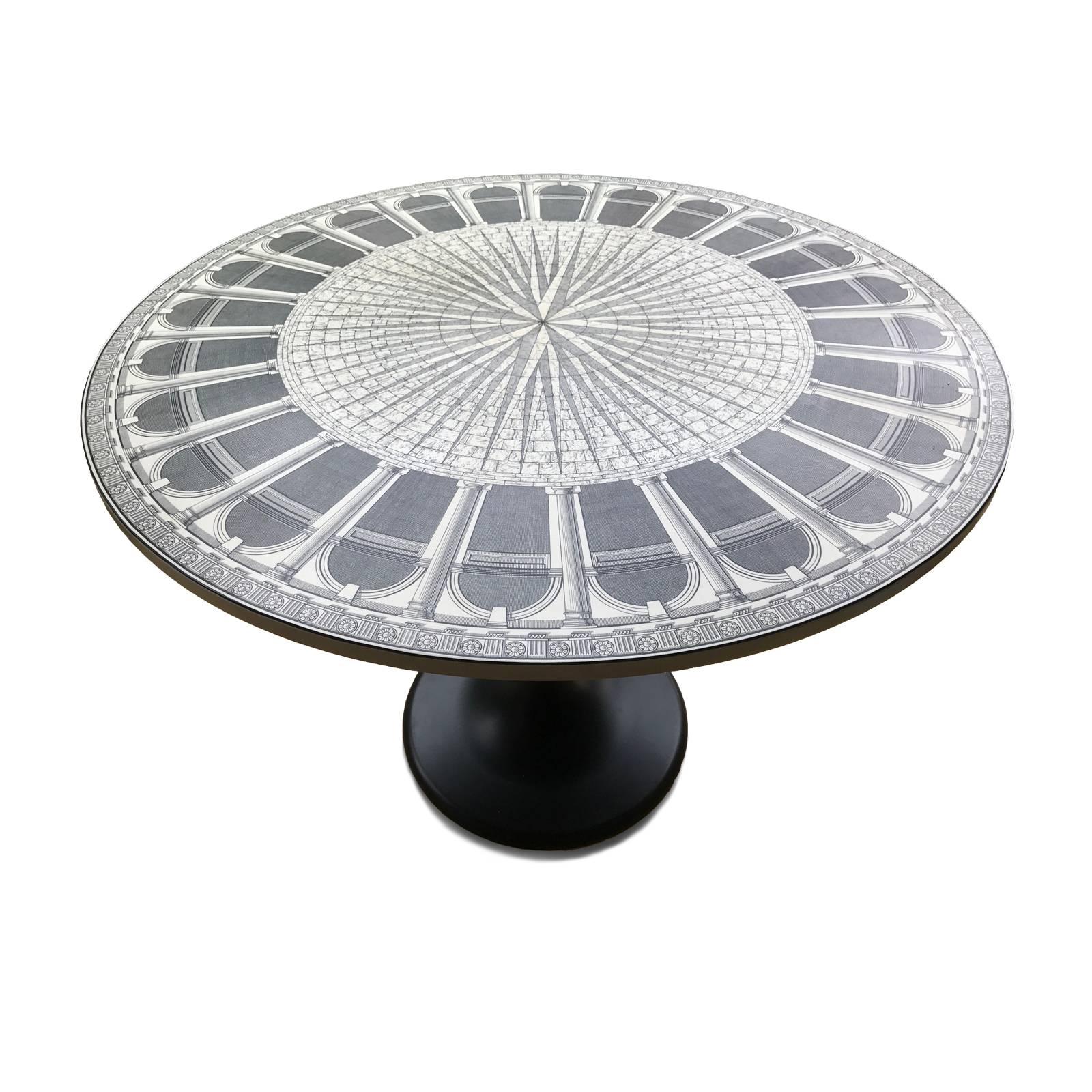 Gorgeous Piero Fornasetti table, signed and limited edition 3 of 4 pieces, 1991. The top is lithographically printed on wood and lacquered on black satin metal base.