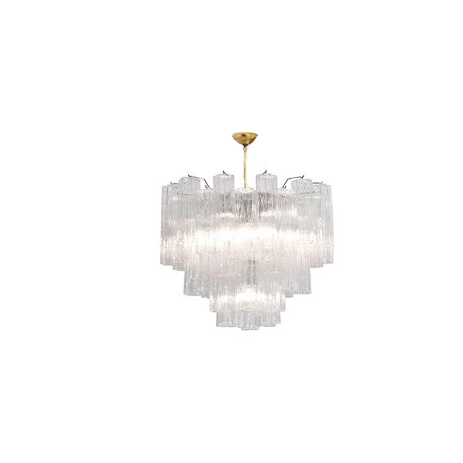Stunning chandelier composed by a total of 48 tronchi glass prisms on a brass frame: 8 on the bottom row, 16 on center and 24 on the top row. 
The tronchi glass tubes are textured and scalloped, each measuring 10 1/8