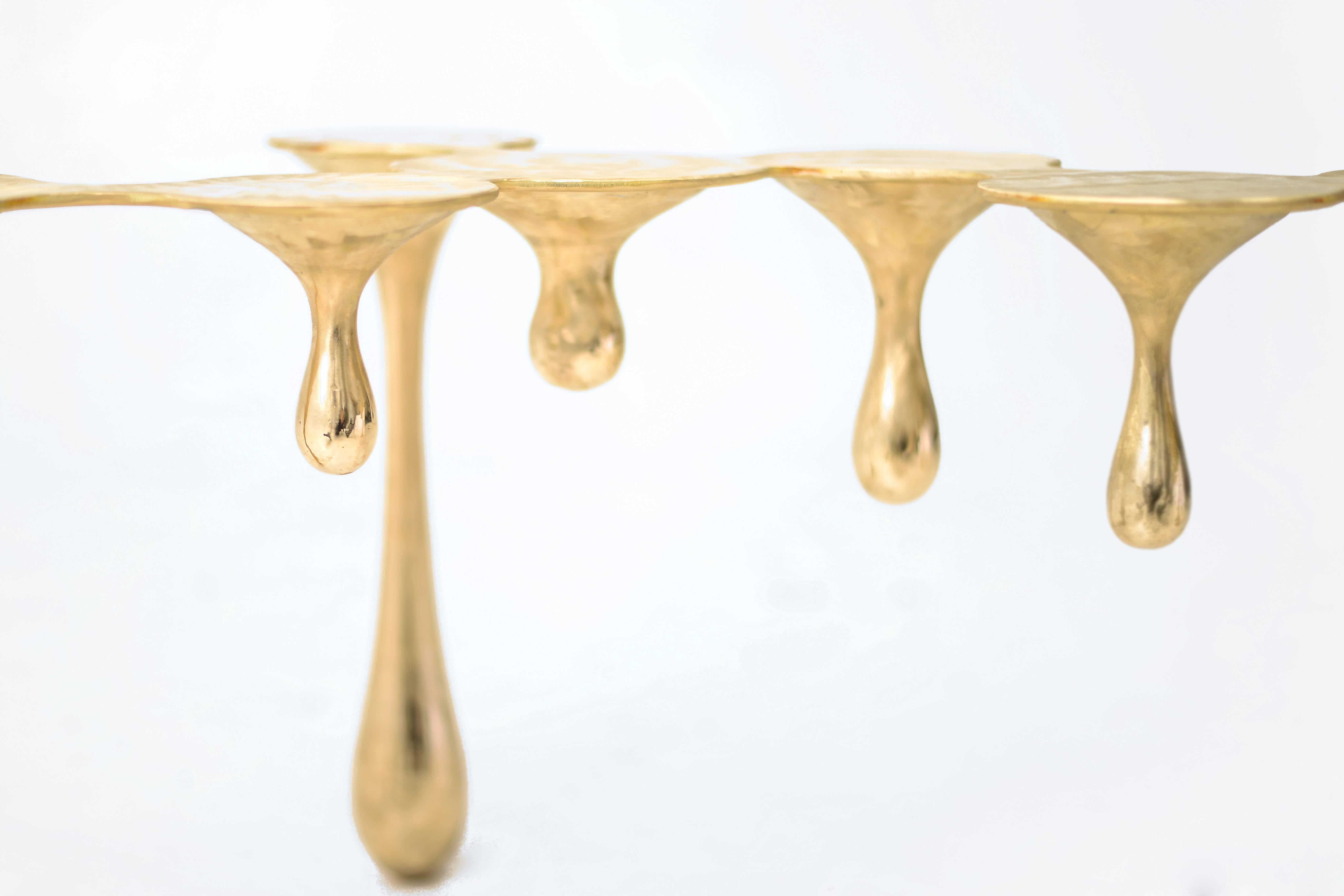 melting brass console table