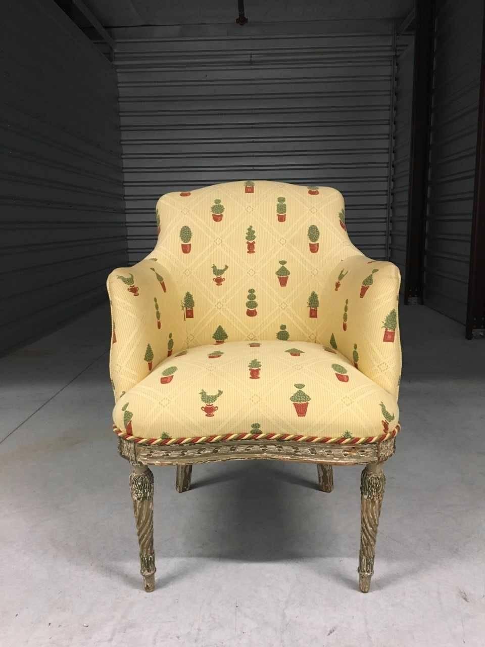 Early 20th century bergère in the French Louis XVI taste; paint decorated frame- naturally worn; chair has been recently upholstered.