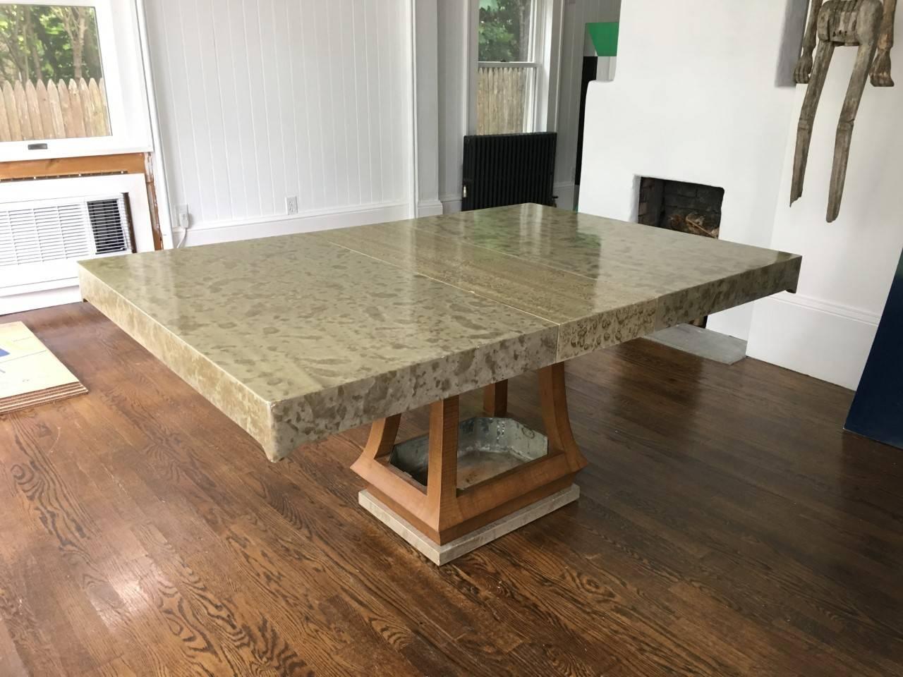 Unique James Mont custom designed extension dining table in the Asian style.
Lacquered tabletop and tiger maple base concealing a tin removable tray (for plants or liquor).

New York, 1960s.
Measures: Table extends to 60" long.