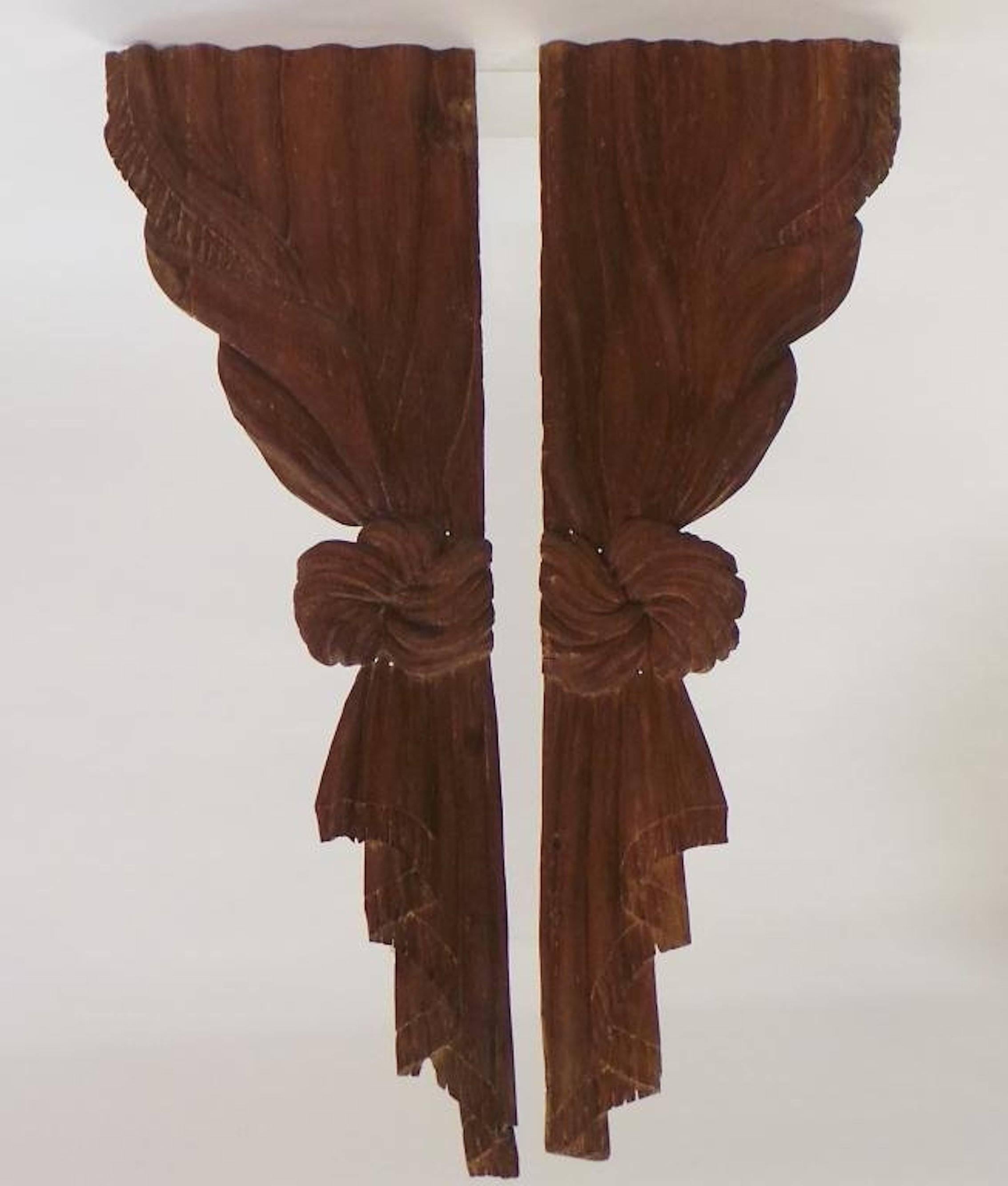 A pair of 19th century Continental carved oak curtain panels as architectural elements. 

Dimensions: 48