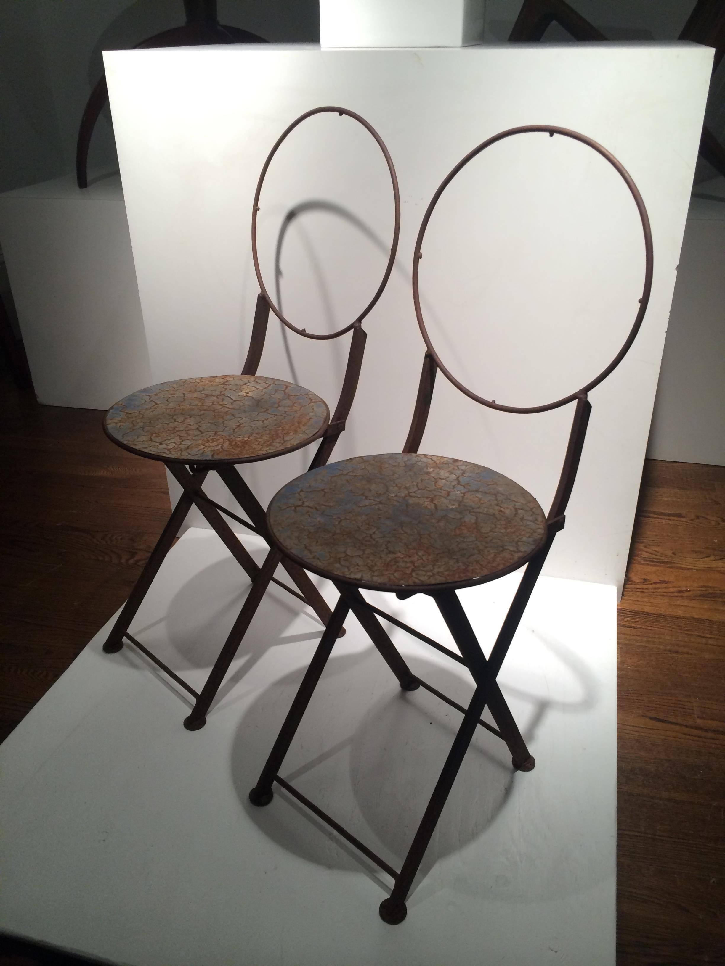 Pair of Modernist Collapsable chairs, France, 1960. Iron frames. 