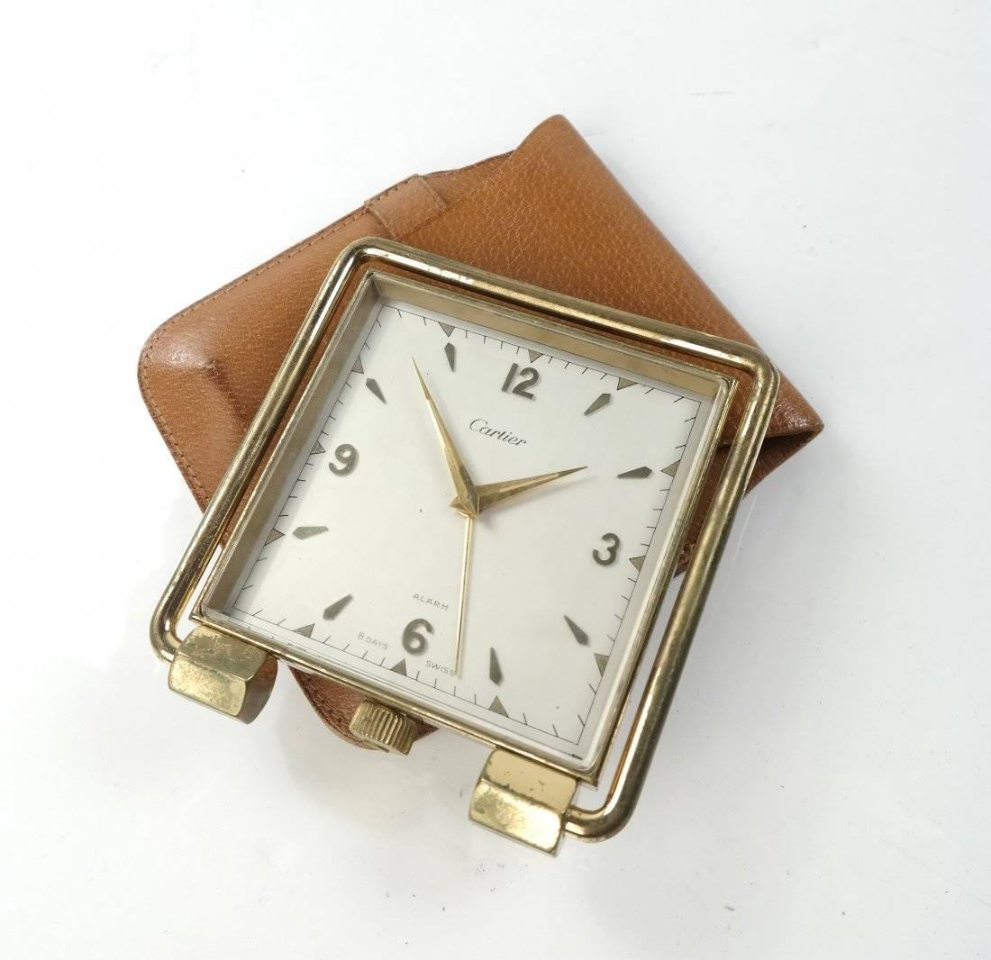 8-day square travel clock, made in Switzerland. [Clock face: 3