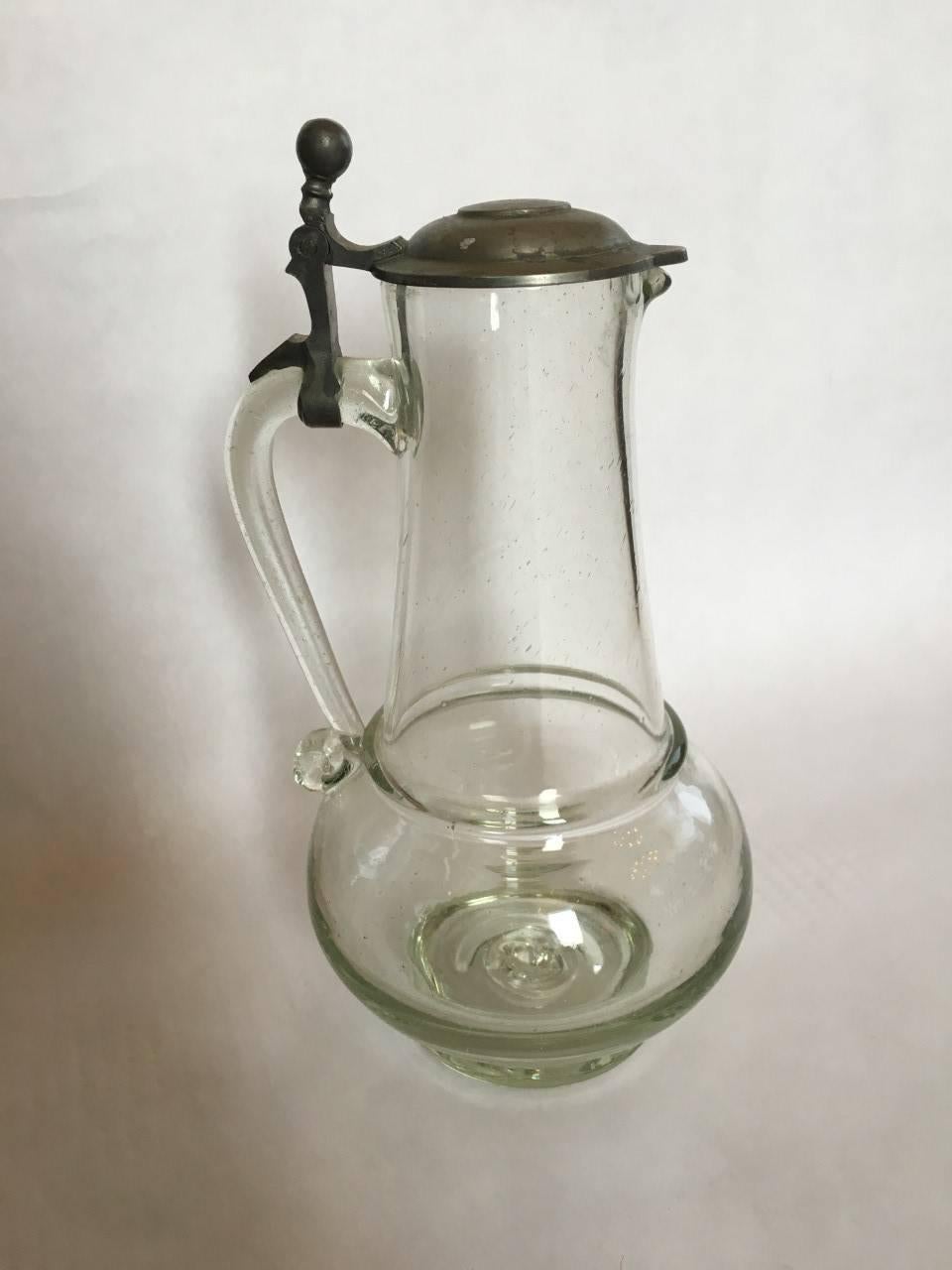 German blown glass pitcher with pewter lid, early 20th century.