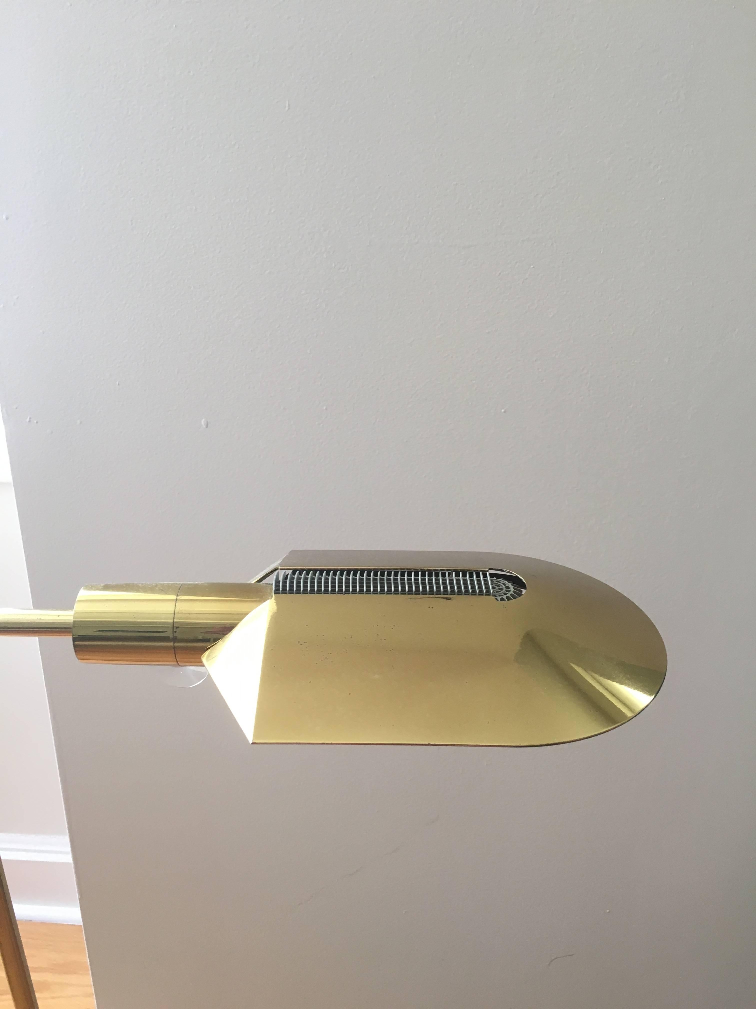 Cedric Hartman 1970's adjustable reading lamp of rare form; lacquered brass, galvanized steel, original lucite knob. Signed and stamped to the underside in steel.  

*Three available, priced individually. 

Provenance: Private Residence, East
