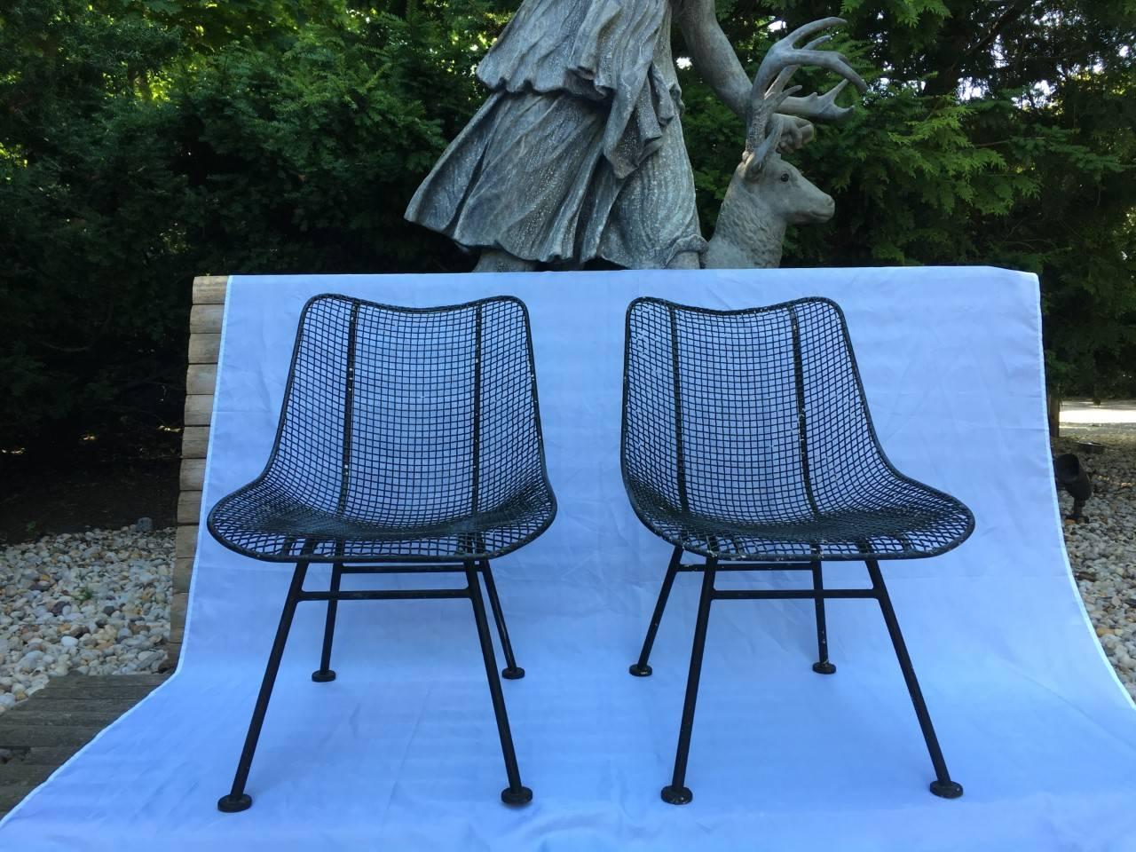 A rare pair of Russell Woodard iron slipper chairs for garden, patio or interior, 1960.