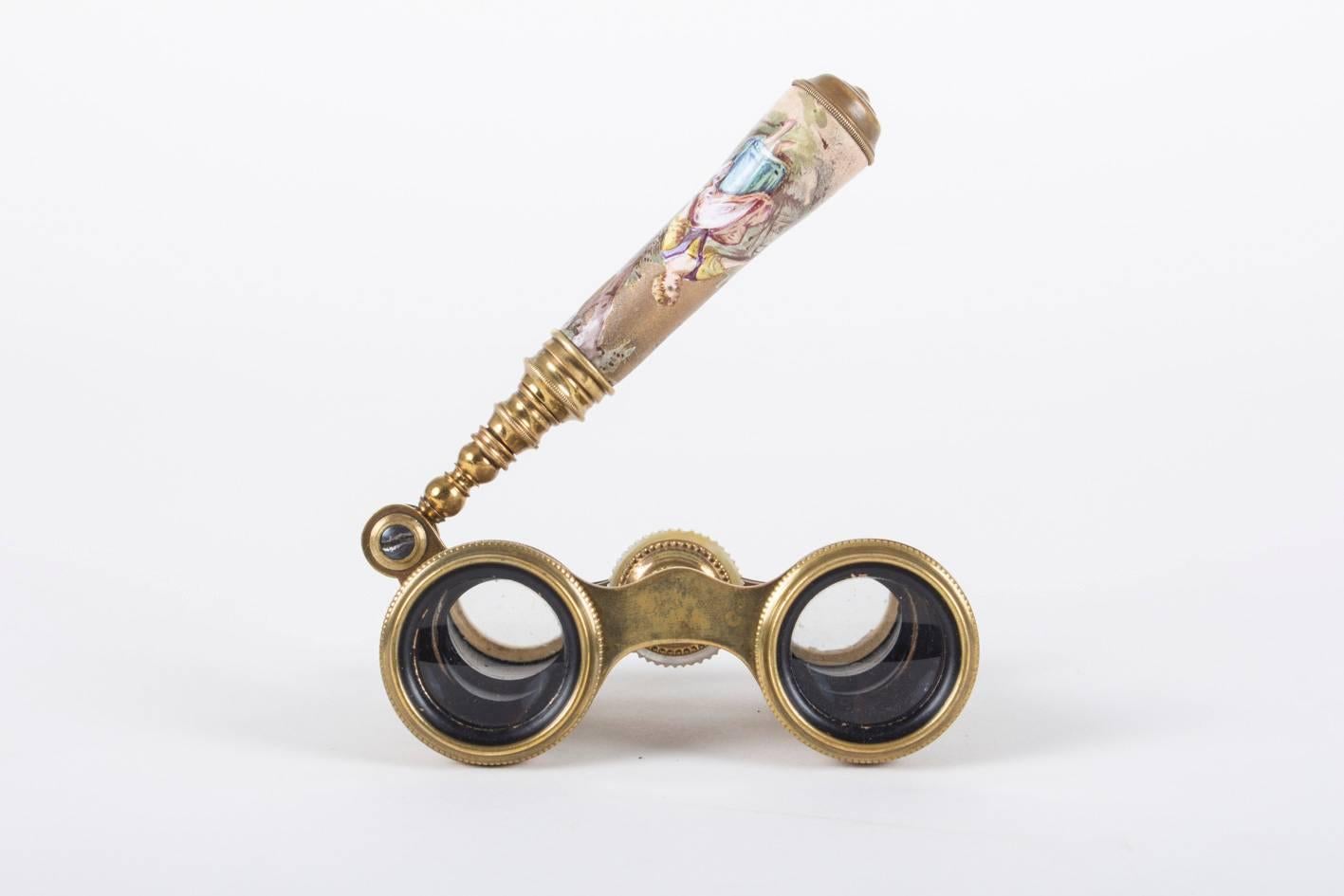 Elegant and fine, circa 1880-1900, French kiln-fired enamel opera glasses or binoculars in smaller size for ballet, etc.

This one is enameled on both barrels and also the barrel of the expanding lorgnette handle, the set has not a bit of loss to