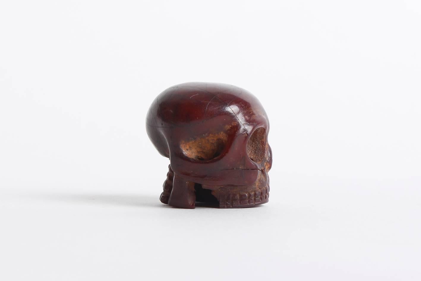 Finely carved amber, probably Japan, circa 1800, Tokugawa period.

Please find our other skull miniatures listed here on 1stdibs.
