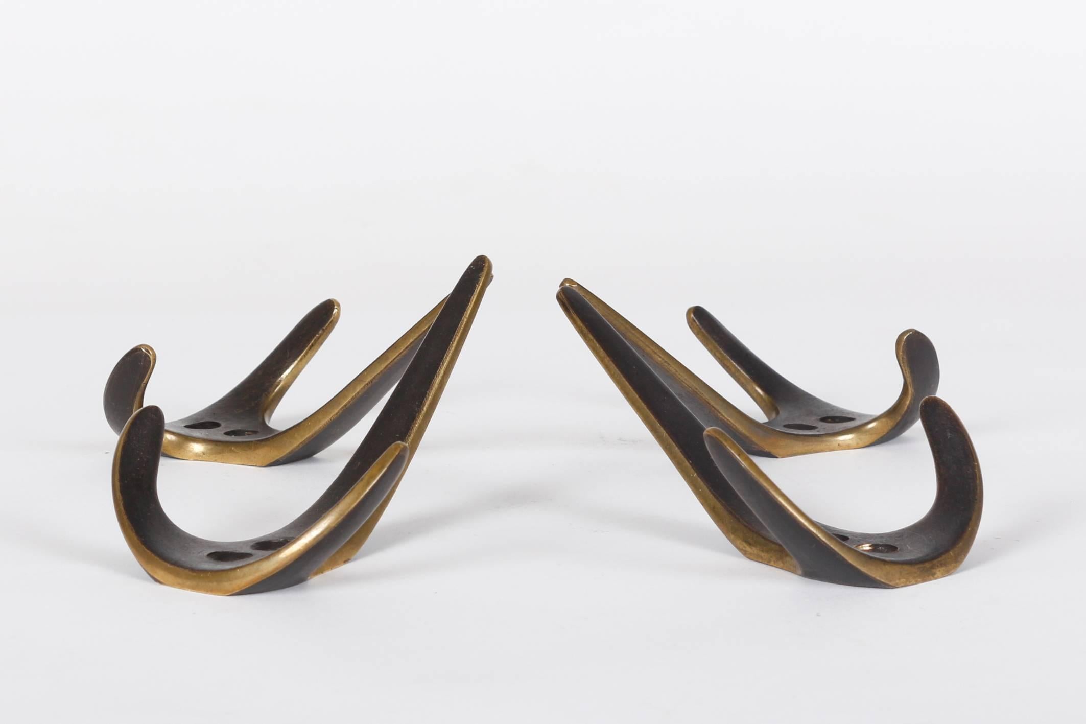 Brass Striking Mid-Century Set of Four Carl Auböck Coat Hooks 