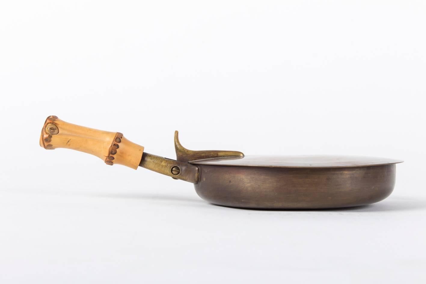 Another nice example of the countless designs by Carl Auböck,
made of brass and bamboo, marked at the handle.