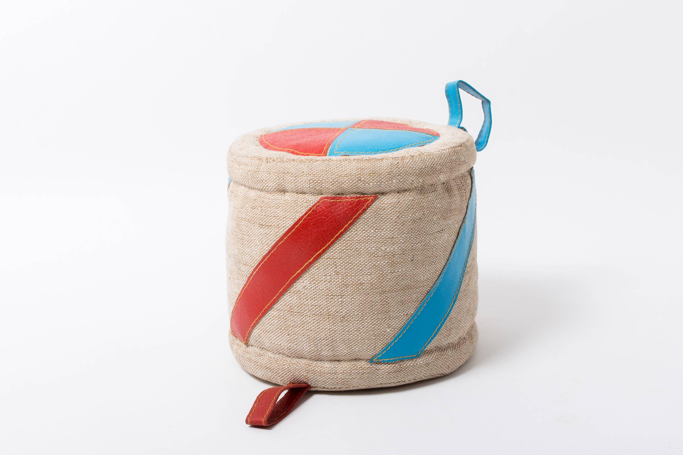 One of the typical jute and two colored leather seating cushion by Renate Müller. The presented cushion was made just before her retirement in 2009.

Please find our other listings of toys designed by Renate Müller.