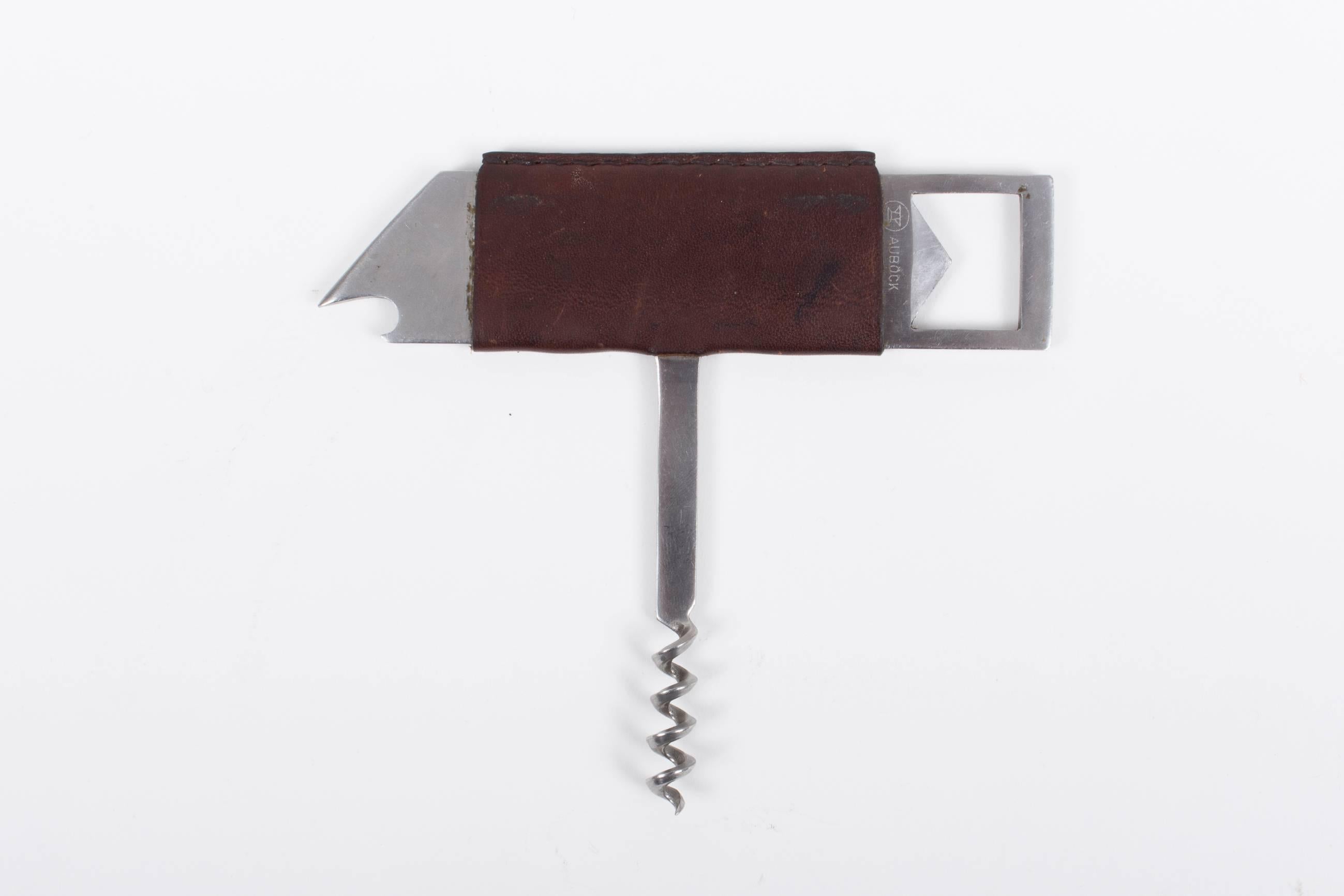 Mid-20th Century Rare Auböck Leather Covered Bottler Opener  For Sale