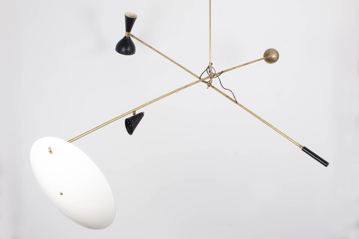 This striking mobile fixture was assembled from vintage parts, newly lacquered screens - in the manner of Stilnovo, Italy, 1950s.

Length 168 cm / 66