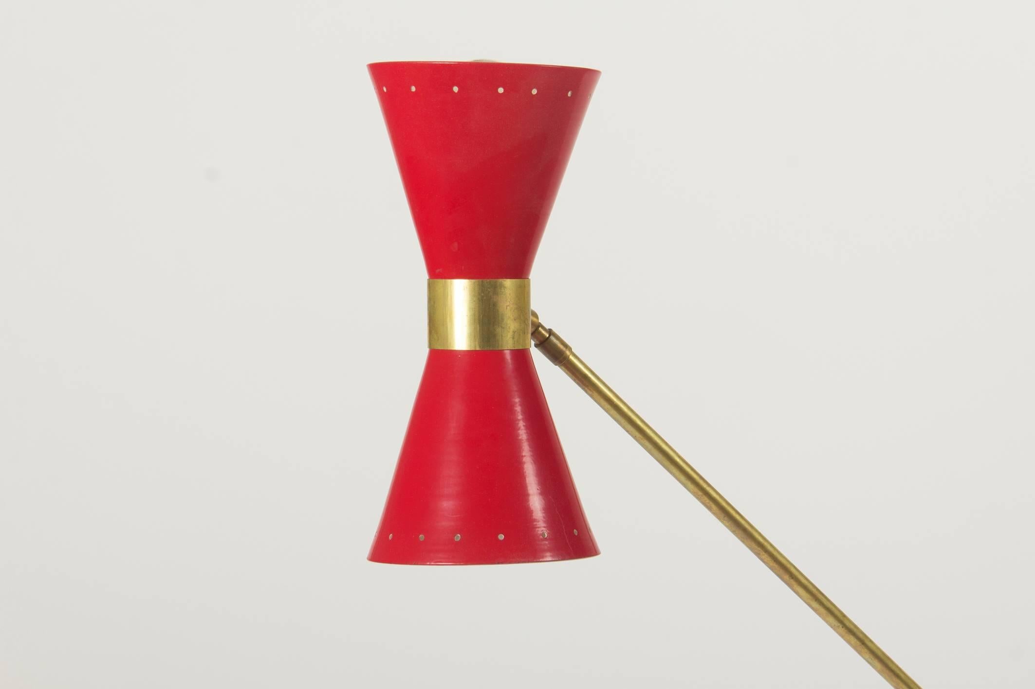 This striking example of Italian Mid-Century design is quipped with two e24 (regular bulb size) and is newly rewired for European standards.
Please not that the given dimensions are for the higher resting position of the brass bar. The lamp can be