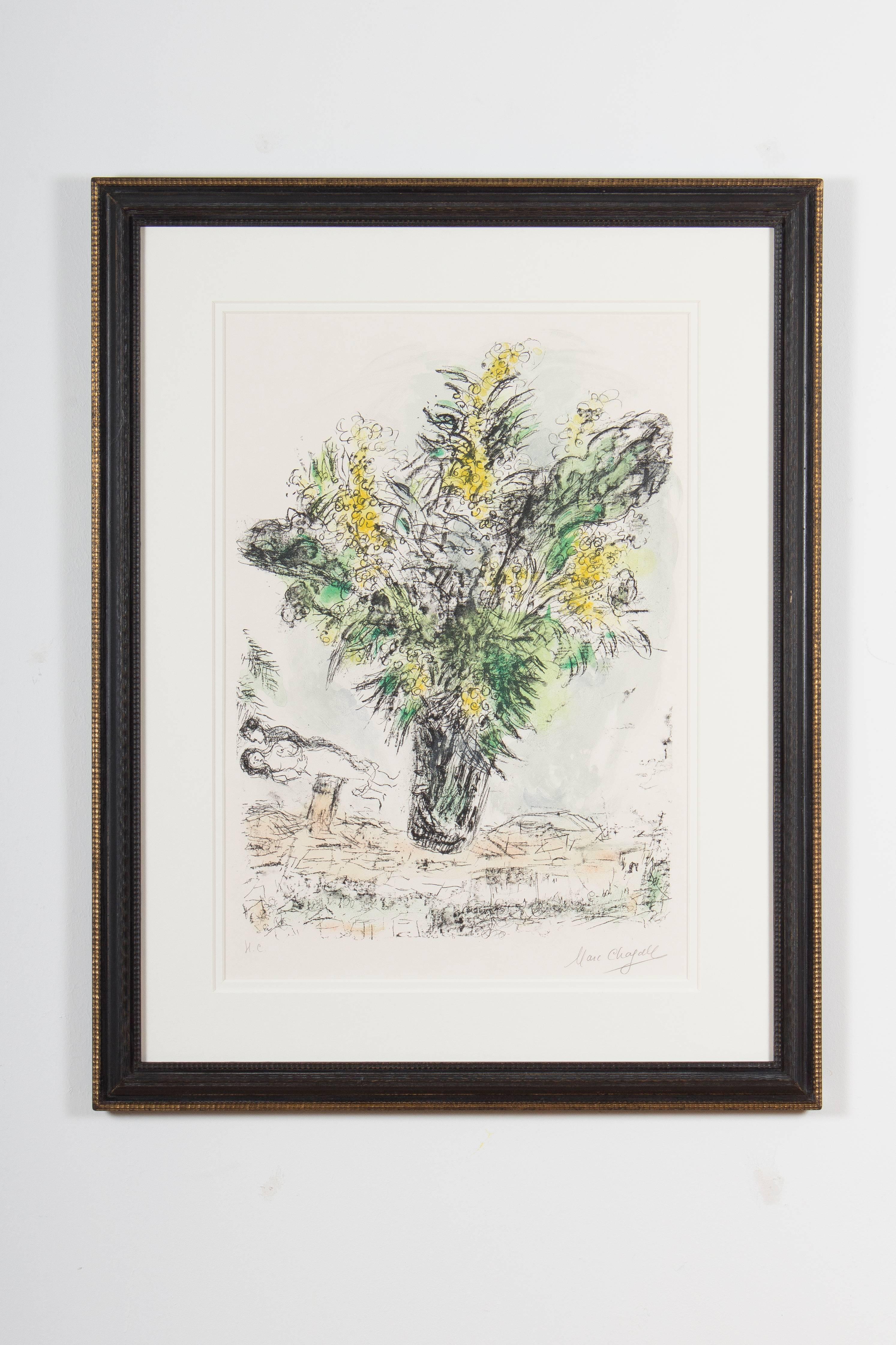 Titled with ''Les Mimosas'' this work was issued by Chagall in 1968 in Paris.
Printed by the fine art workshop of the Mourlot Brothers, the work is hand signed in pencil with ''Marc Chagall' and further labelled with ''H.C.'' for 