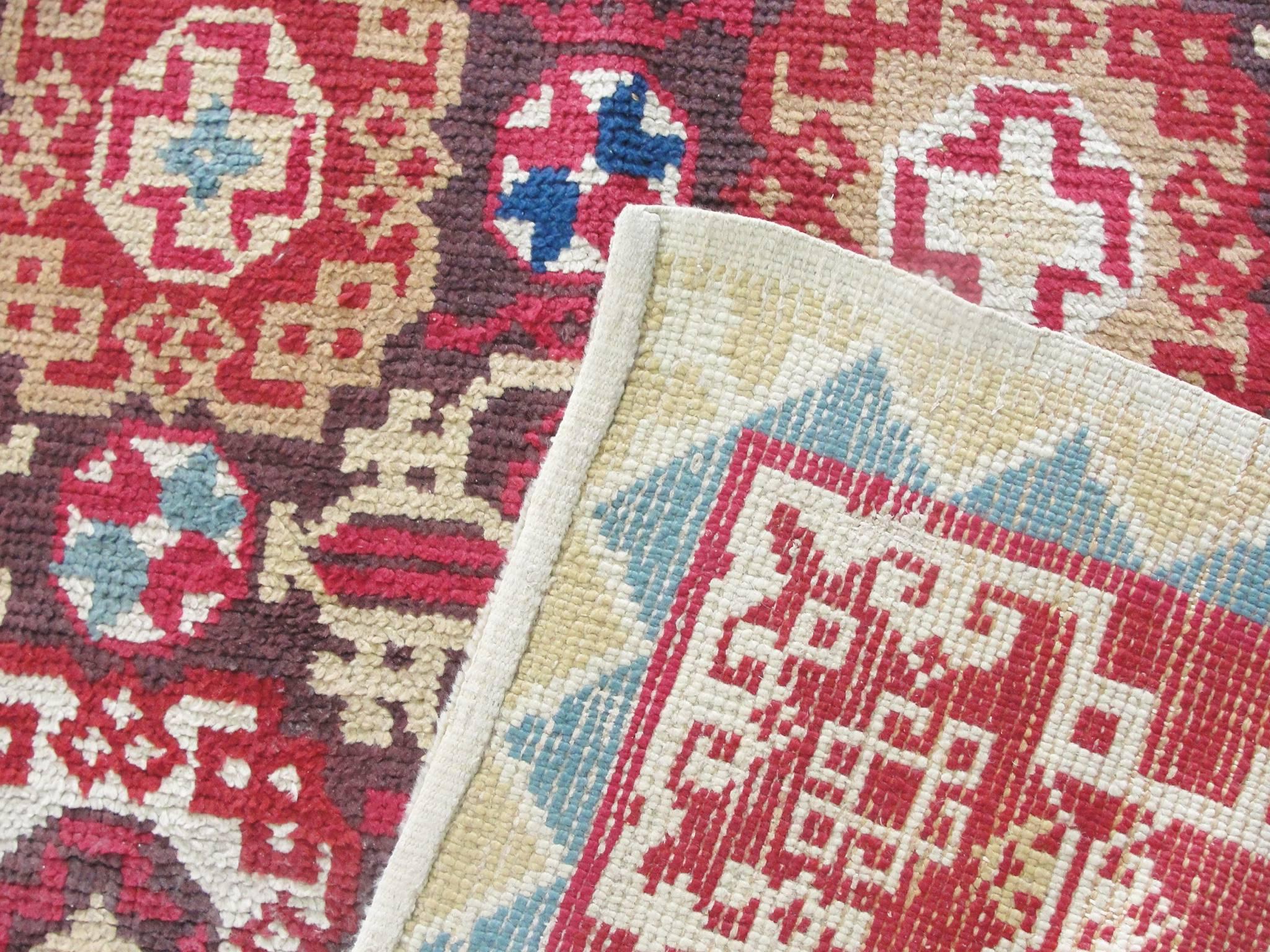 Main centers for production of English rugs were located in Axminster, Wilton and Kidderminster. Distinctive patterns on these antique rugs include deep golden coloration and asymmetrical designs.

This stunning English carpet stands in a long