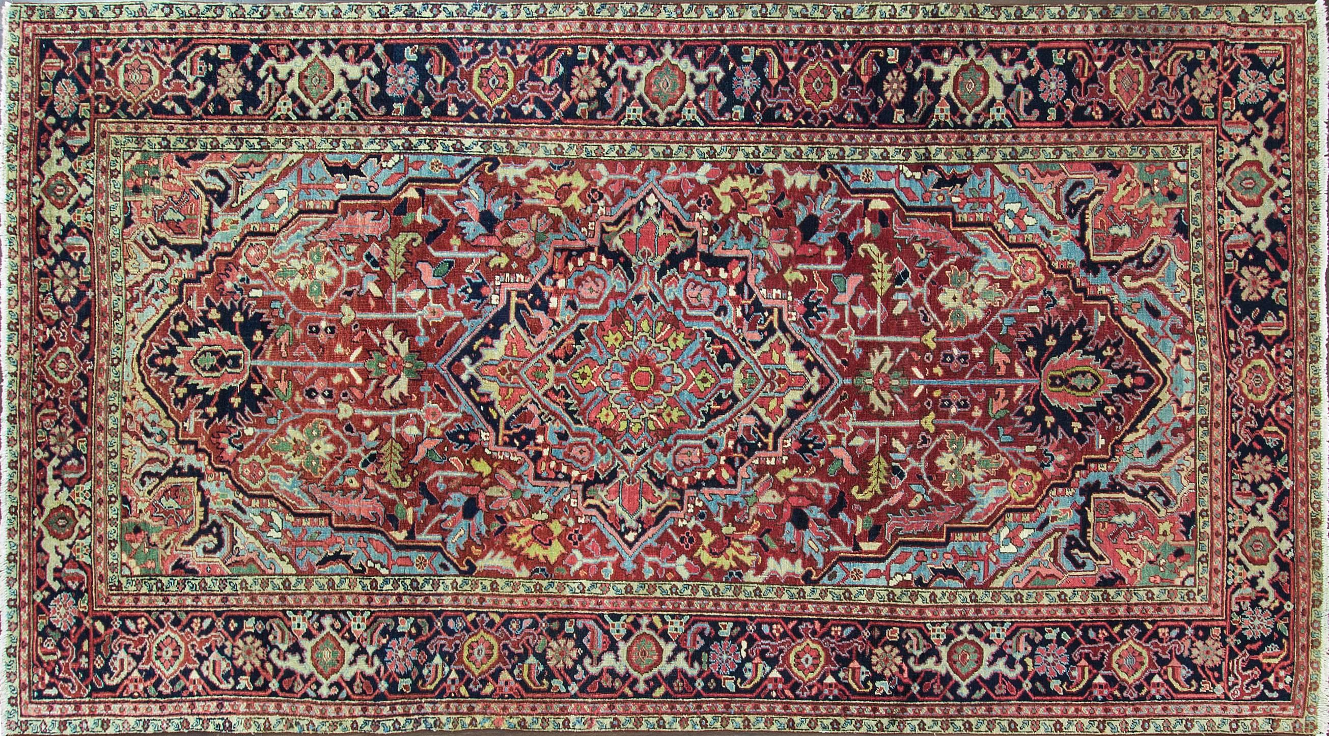 A gorgeous antique Persian Heriz.
A beautiful balanced design antique Persian Heriz.
Natural wool dues, the multicolors are amazingly beautiful, mostly like antique Serapi. Charming large medallion with geometric motives. Heriz rugs are Persian rugs