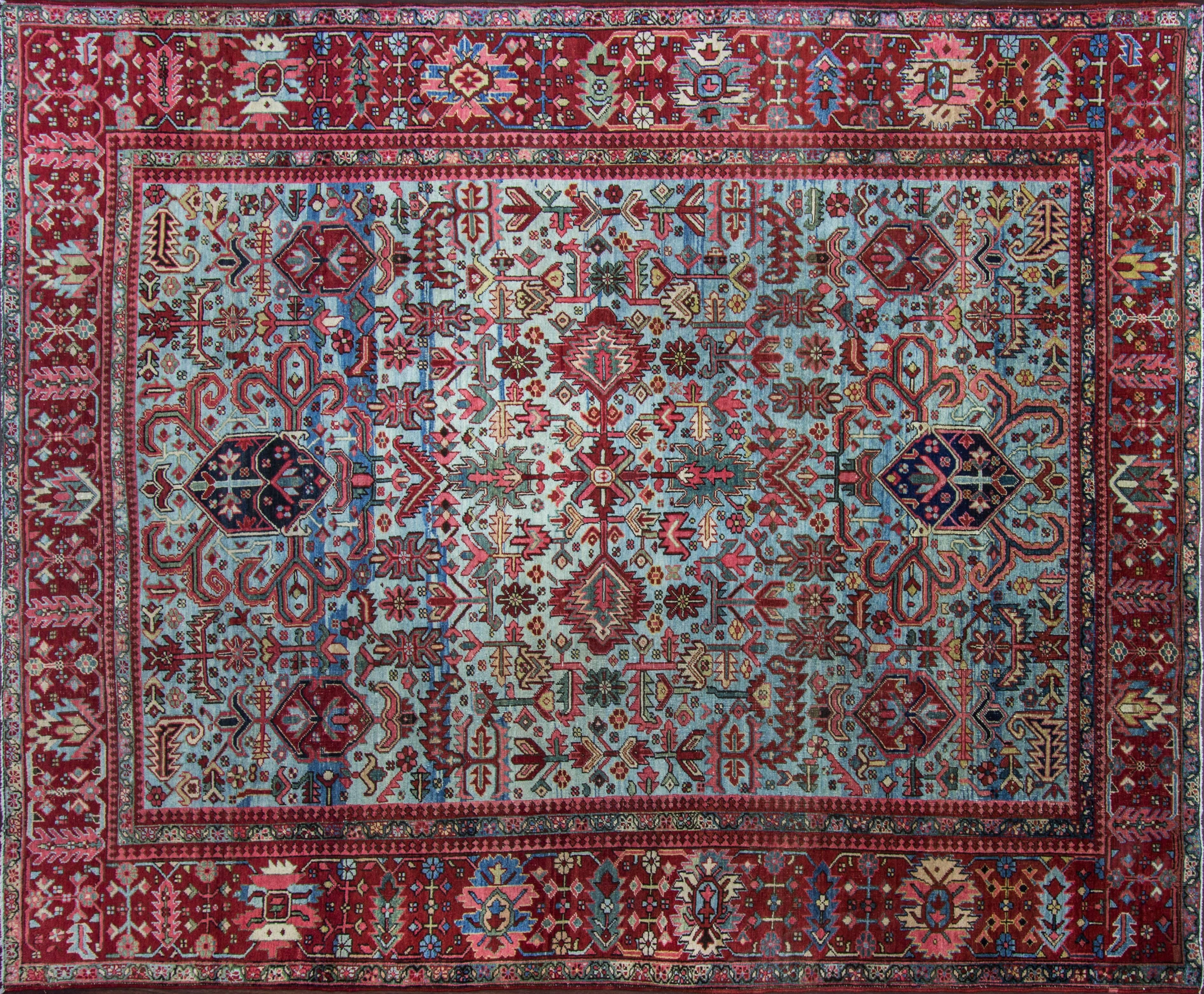 Gorgeous antique Persian Heriz carpet with all-over design and breathtaking baby blue background.
Heriz rugs are Persian rugs from the area of Heris, East Azerbaijan in Northwest Iran, northeast of Tabriz. Such rugs are produced in the village of