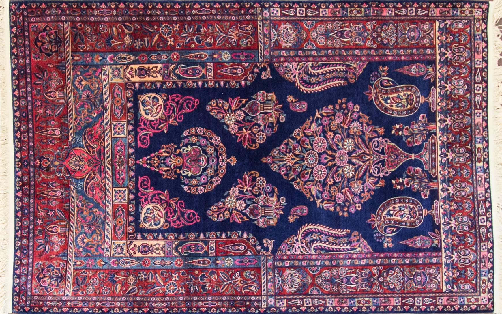 A Kashan rug made in Persia in the city of Kashan in Isfahan Province North Central Iran. There was production of Persian carpet at Royal workshops in the 17th and early 18th century. The Persian carpet workshops ceased production in about 1722