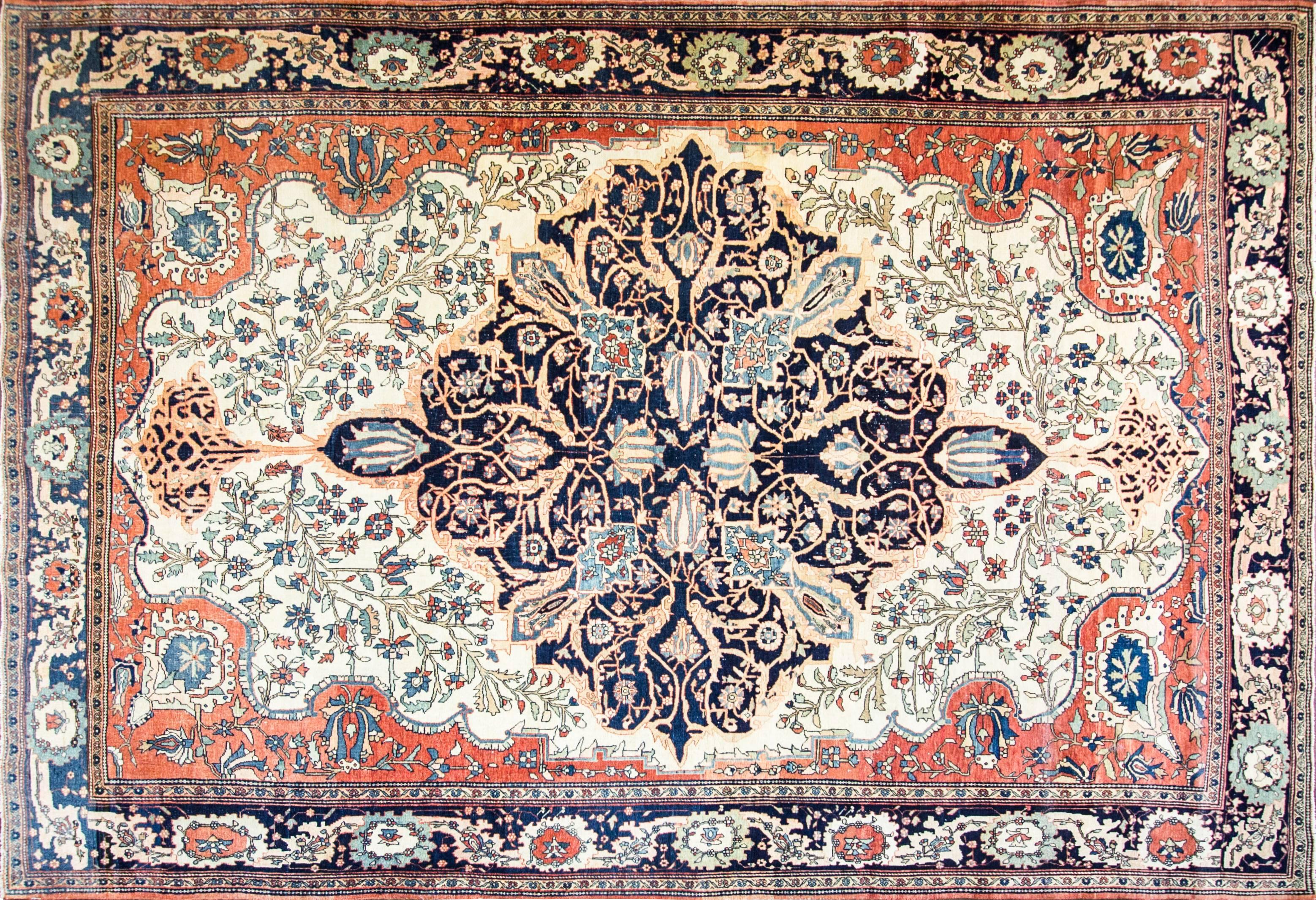 Feraghans were made between the 1870s and 1913 from a region north of the town of Arak, produced for the Persian aristocracy. They are single wefted, long and narrow or room-sized carpets, typically with an all-over Herati design or floral and