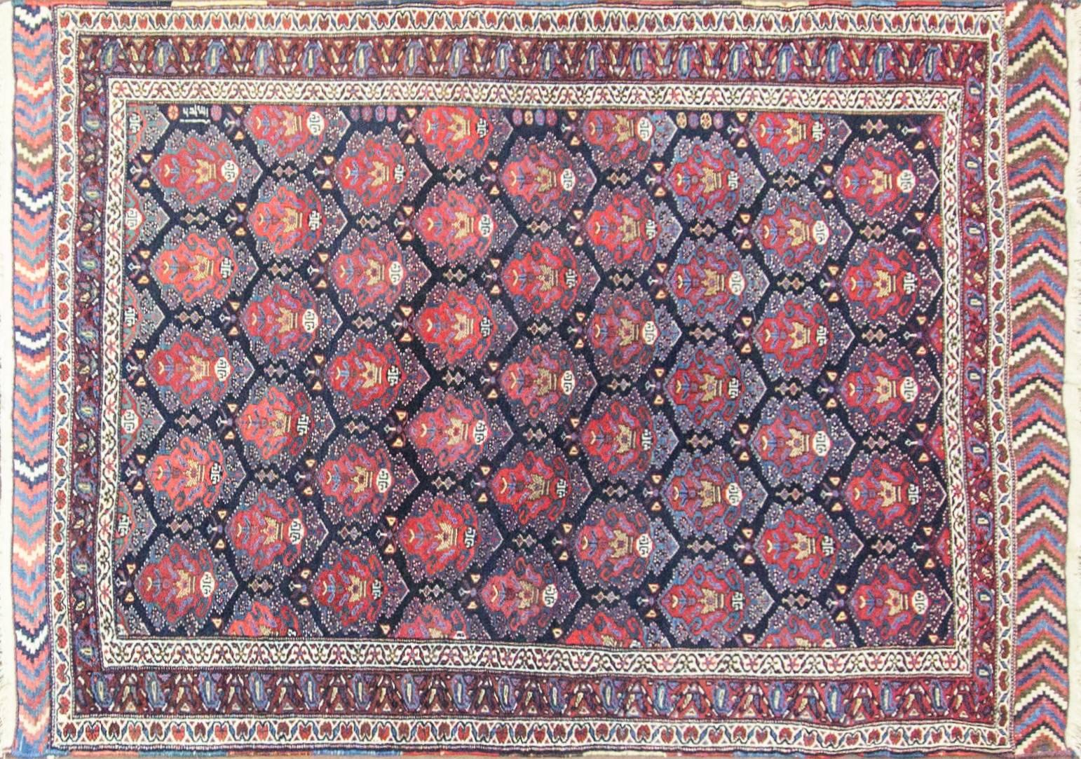 Gerous was formerly a designation for Bidjar carpets in Northwest Persia as well as the name of Kurdish Sub tribe of the area. 
Dated and all-over crown design rug with vegetable dyed wool on wool foundation. 
Beautiful colorful Kilim baft on two