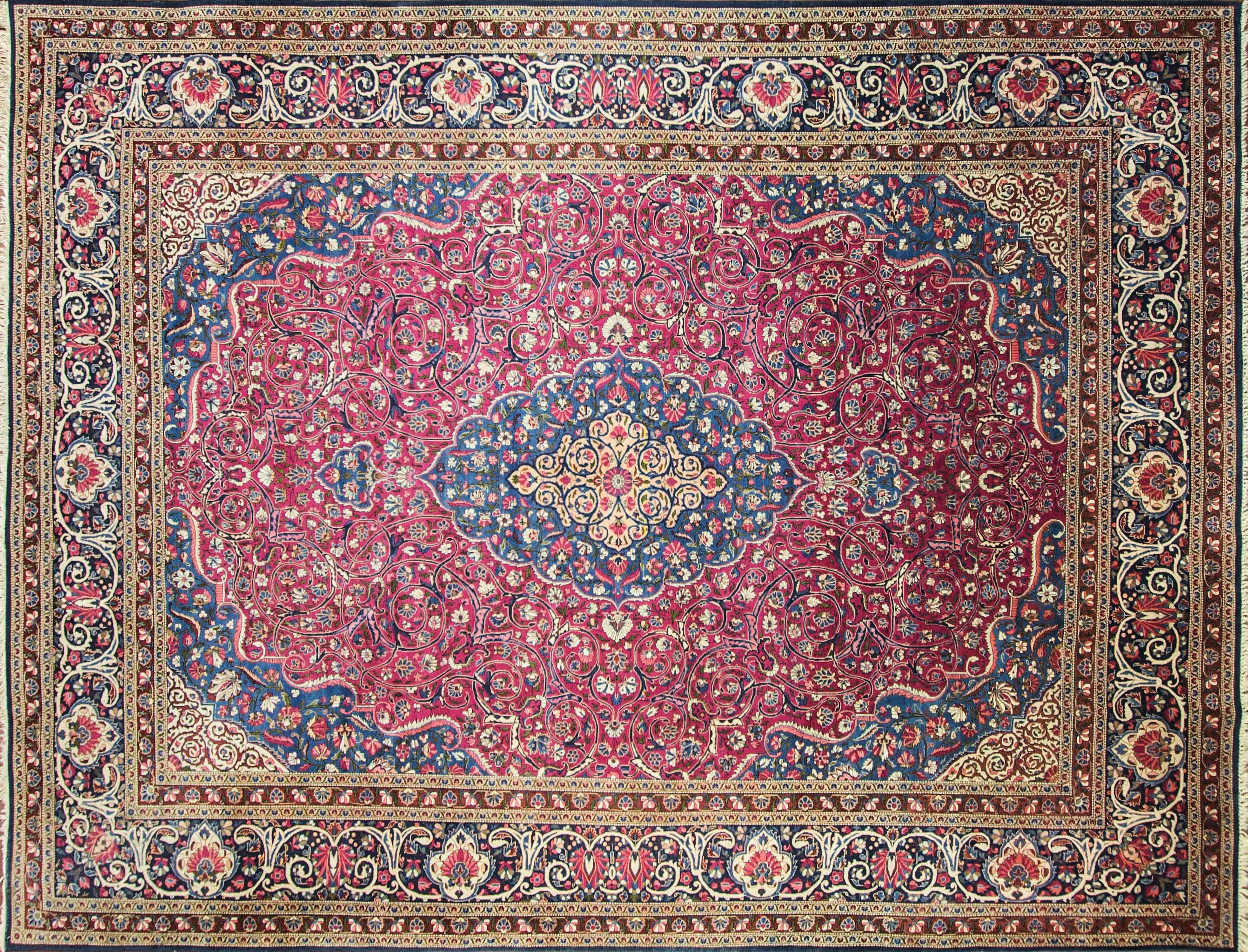 Very fine Persian Dabir Kashan in perfect condition, circa 1920.
Unusual purple red background color.
High density knotting woven from kork wool, creating an intricate design.
From the mid-19th to the early 20th century the finest quality rugs