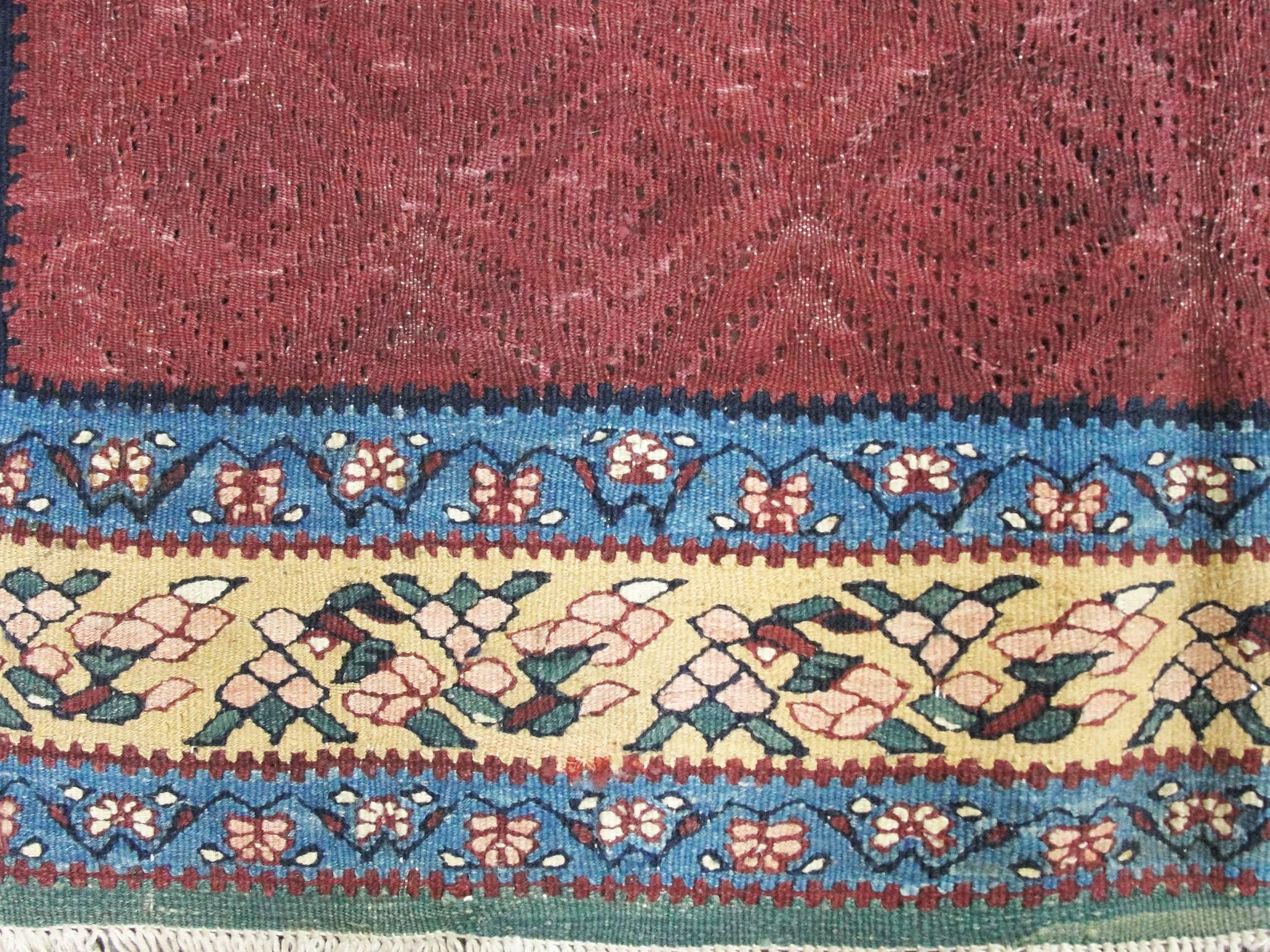 antique senneh rugs