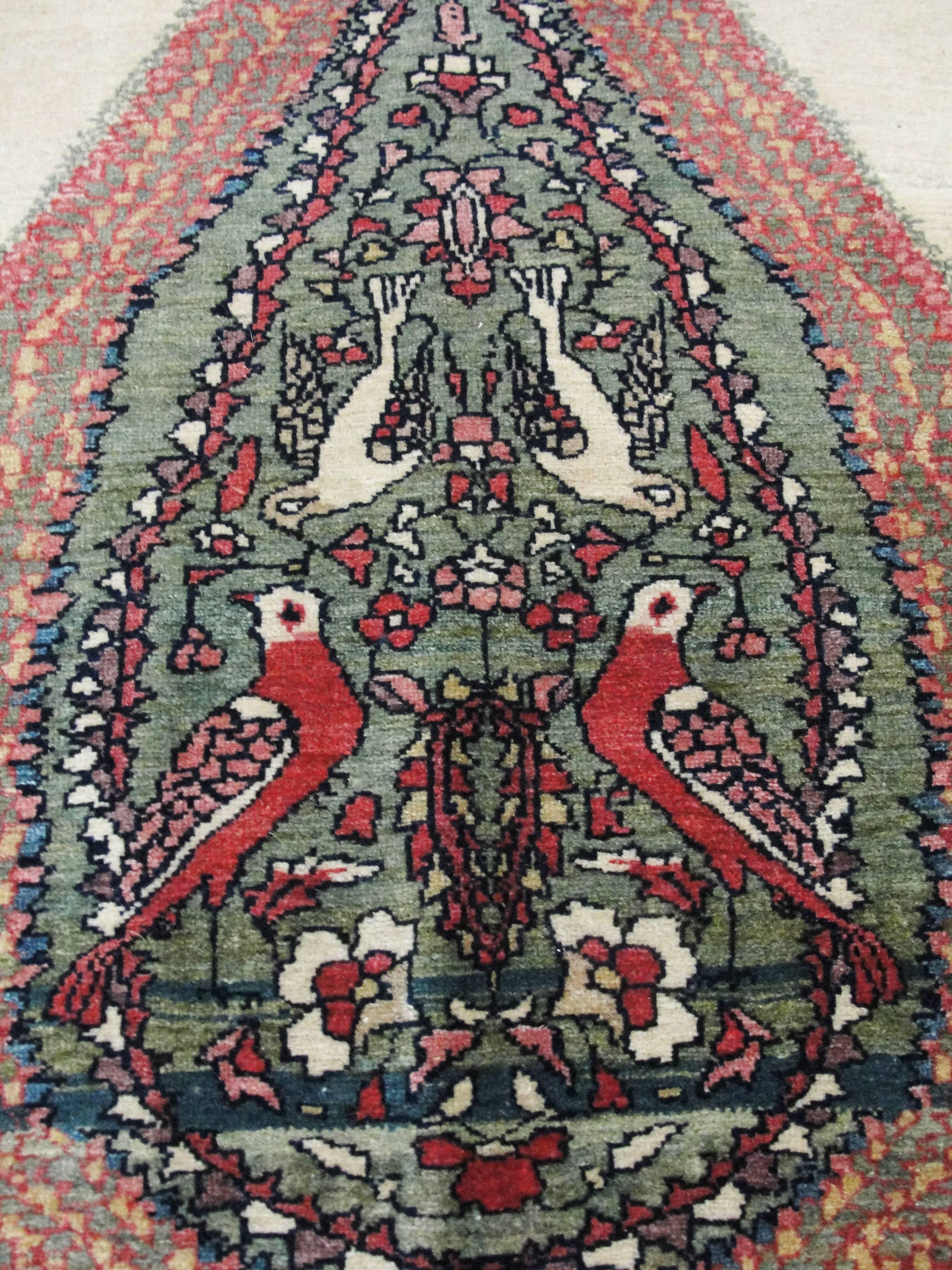 Tree of life Feraghan Sarouk with birds of happiness.
The Feraghan district located south of Tehran, encompassed the cities of Arak, Qum and Kashan, an area with a long and illustrious history of rug and carpet weaving. In the nineteenth century,