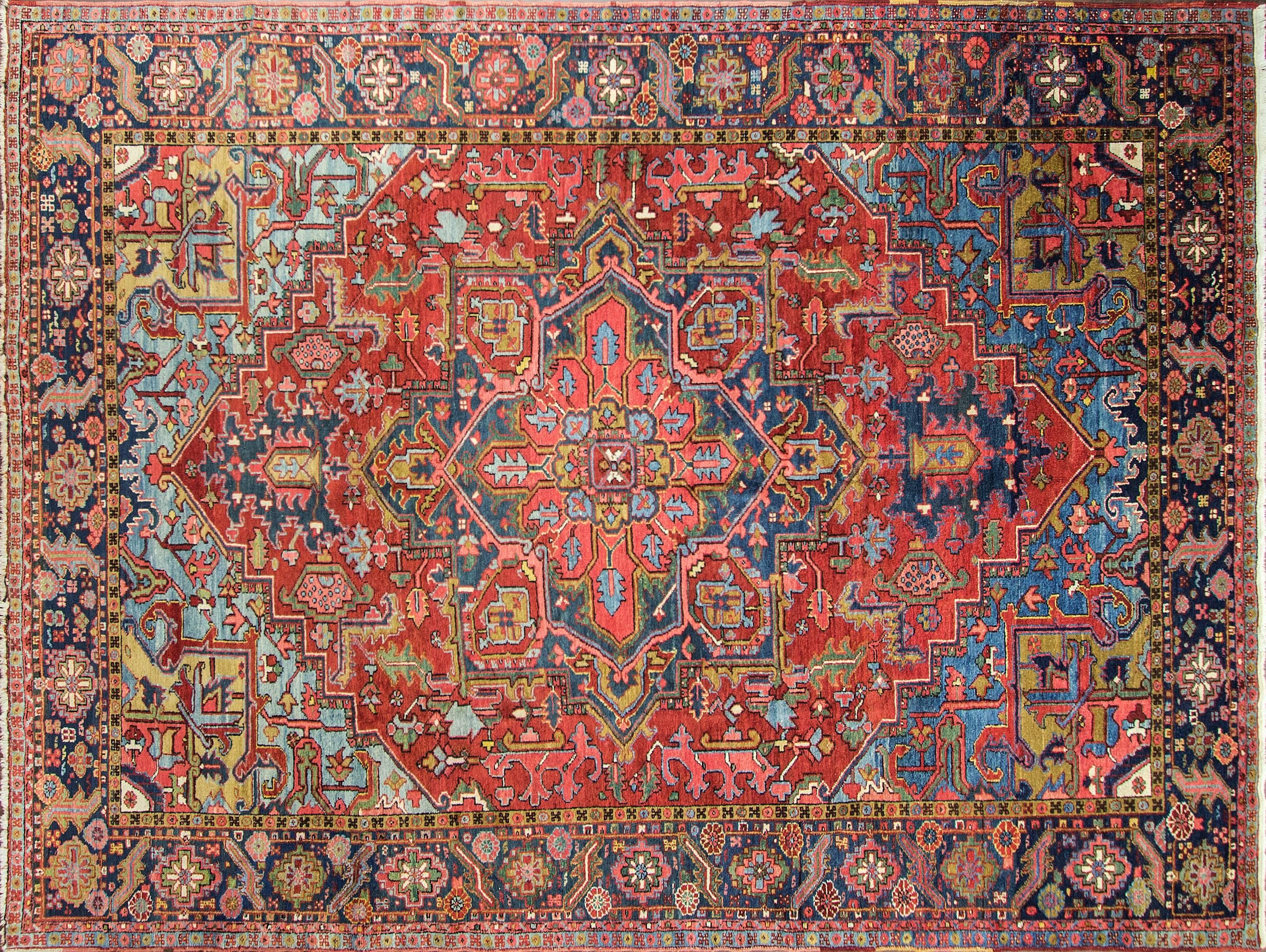 Measures: 8'9" x 12'5". Spectacular Persian Heriz, with fine Karaja weave carpet, circa 1920.
The pile is vegetable dyed wool with spectacular colors.
The condition is excellent with full pile.
Heriz rugs are Persian rugs from the area