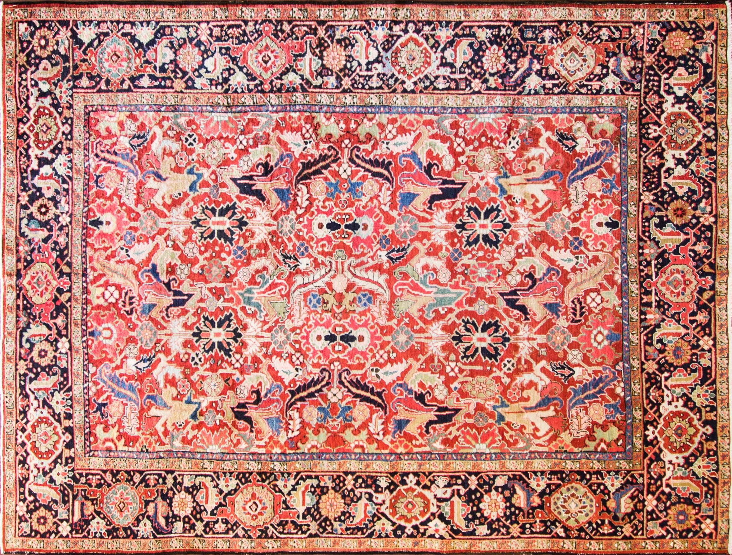 Preciosa alfombra persa antigua Heriz con diseño integral e impresionante color rojo ladrillo de fondo. Las alfombras Heriz son alfombras persas de la zona de Heris, al este de Azerbaiyán, en el noroeste de Irán, al noreste de Tabriz. Estas