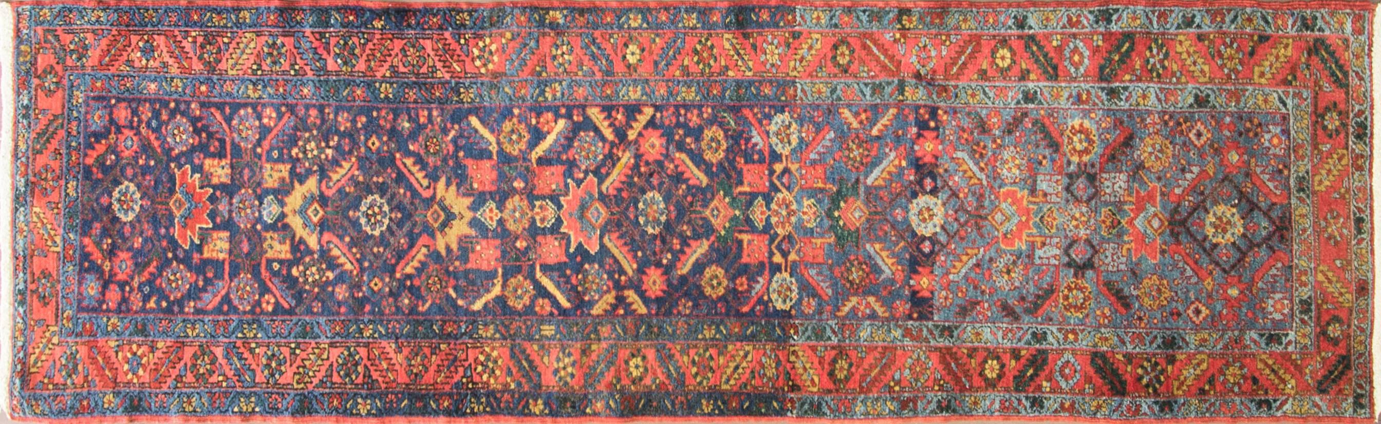 Charming: The light blue color changing to darker blue and vibrant design.
Gorgeous antique Persian Heriz runner with all-over design and breathtaking blue background color. Heriz rugs are Persian rugs from the area of Heris, East Azerbaijan in