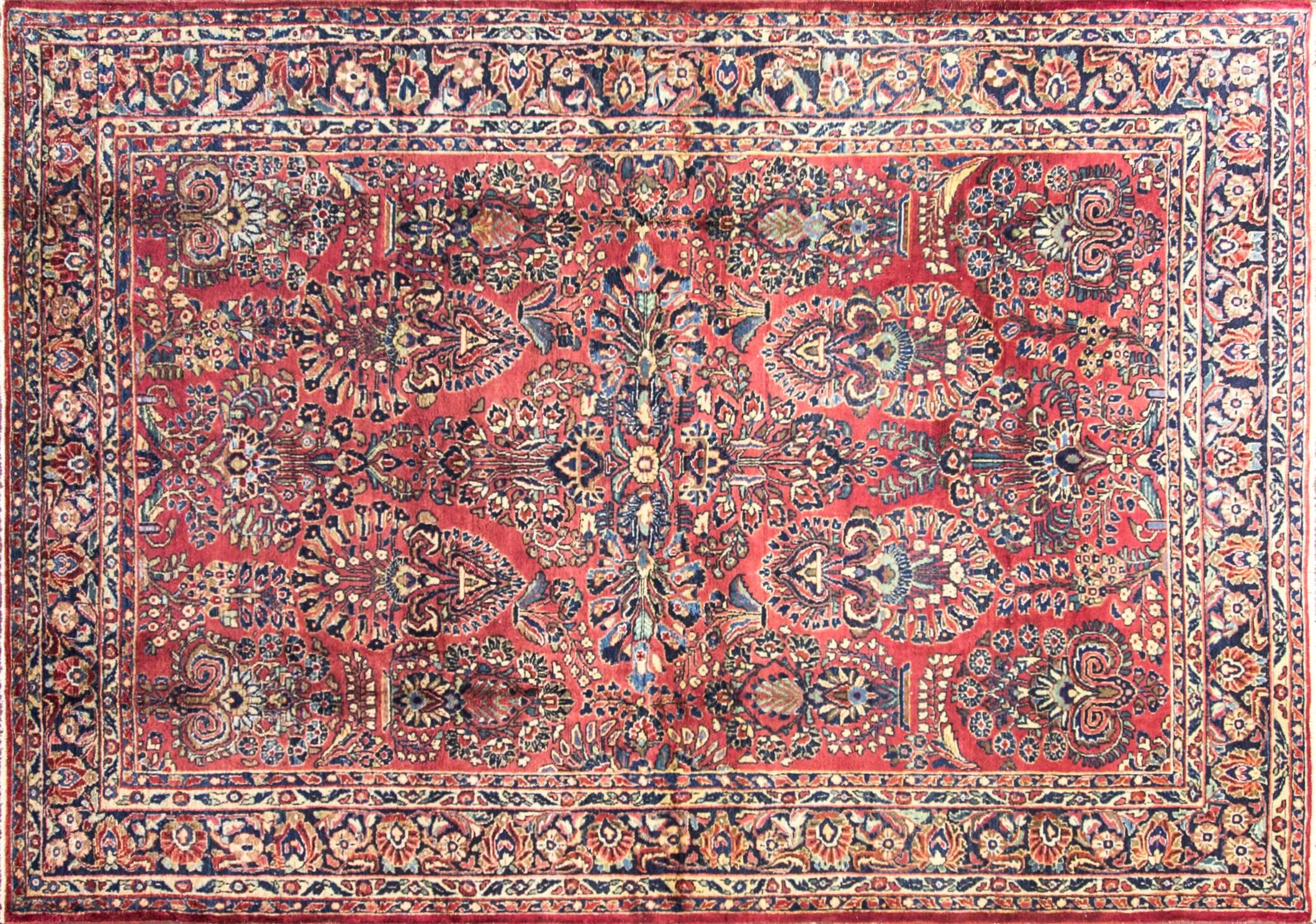 Great size painted Persian Sarouk, circa 1920 in excellent condition and Fine quality.
Sarouks also called Sarouks are double-wefted, heavier carpets with a higher knot count than rug from the village of Sultanabad. Fields are often blue or ivory