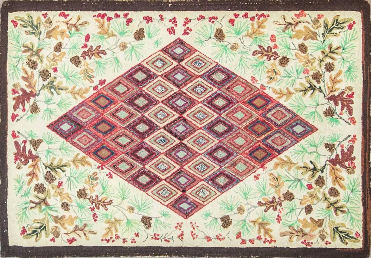 The production of Hooked rugs began in the 1840s. Measures: 3.3" x 4.9".
The materials consisted of linen, flax, hemp, and eventually imported Indian jute.
The most common design found in the earliest rugs was floral, expanding to