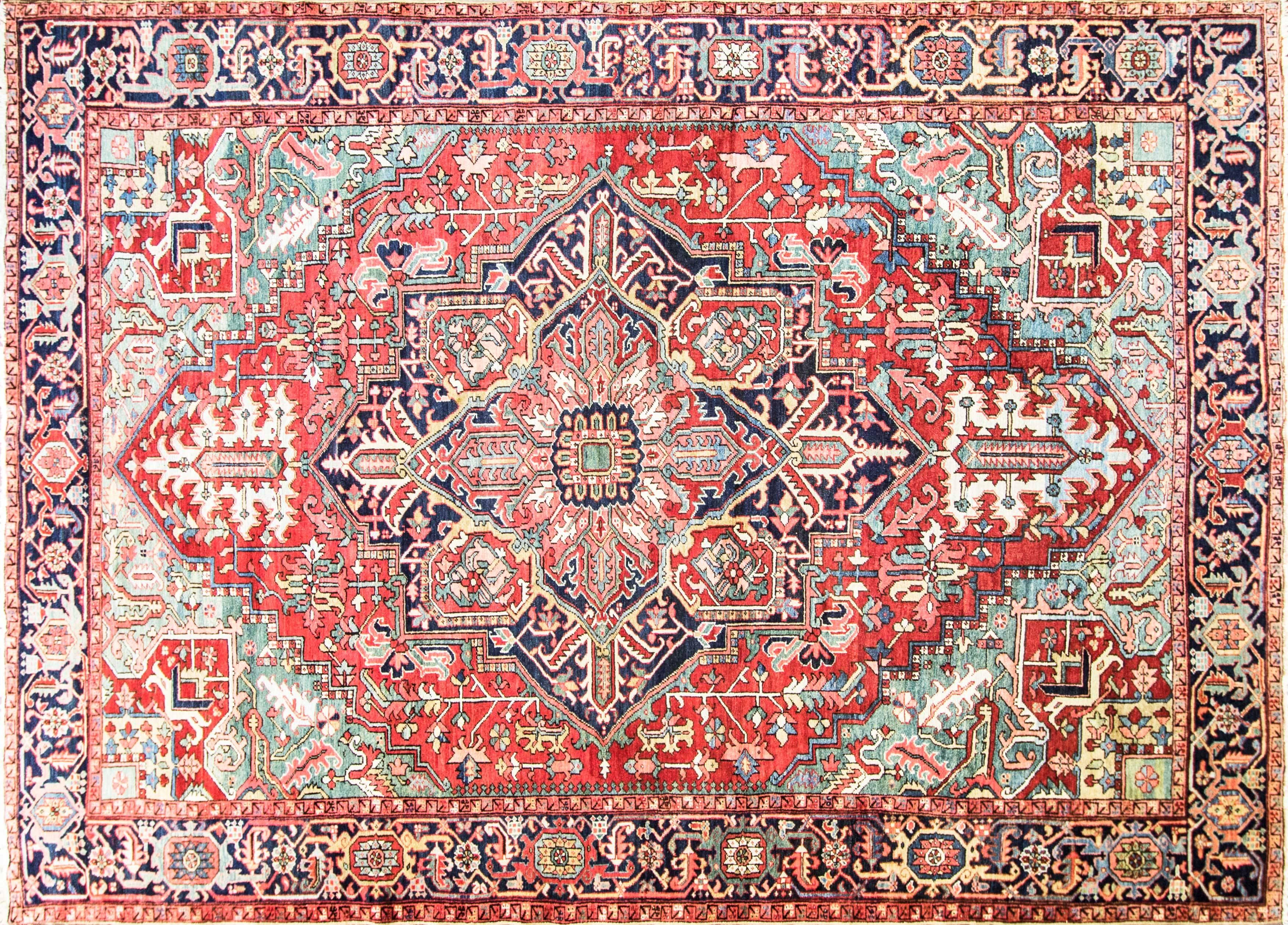 A charming antique Persian Heriz carpet it has a range of outstanding colors.
 A great painting is measure by beauty of its colors and the same statement goes for this rug. Heriz rugs are Persian rugs from the area of Heriz, East Azerbaijan in