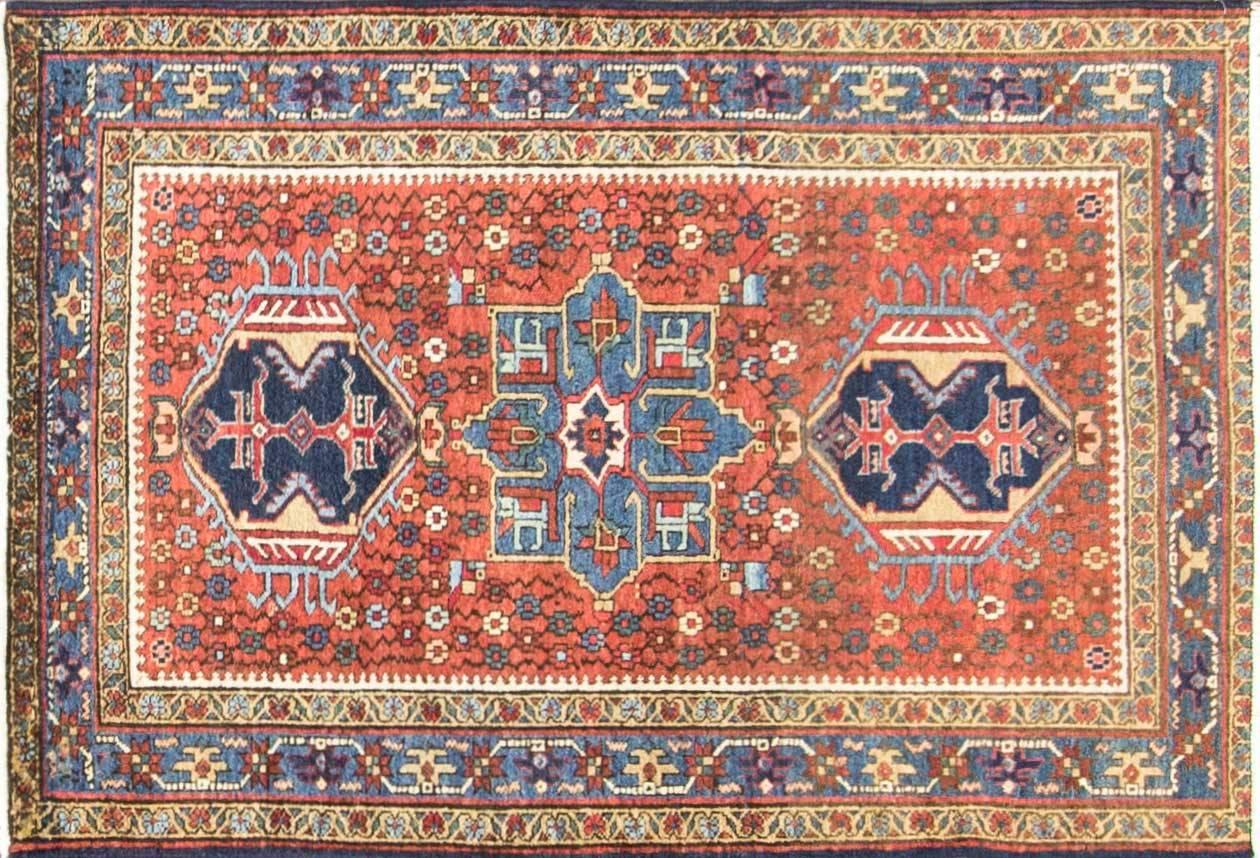 Spectacular antique Persian Heriz carpet. A great painting is measure by beauty of its colors and the same statement goes for this rug. Heriz rugs are Persian rugs from the area of Heris, East Azerbaijan in northwest Iran, northeast of Tabriz. Such