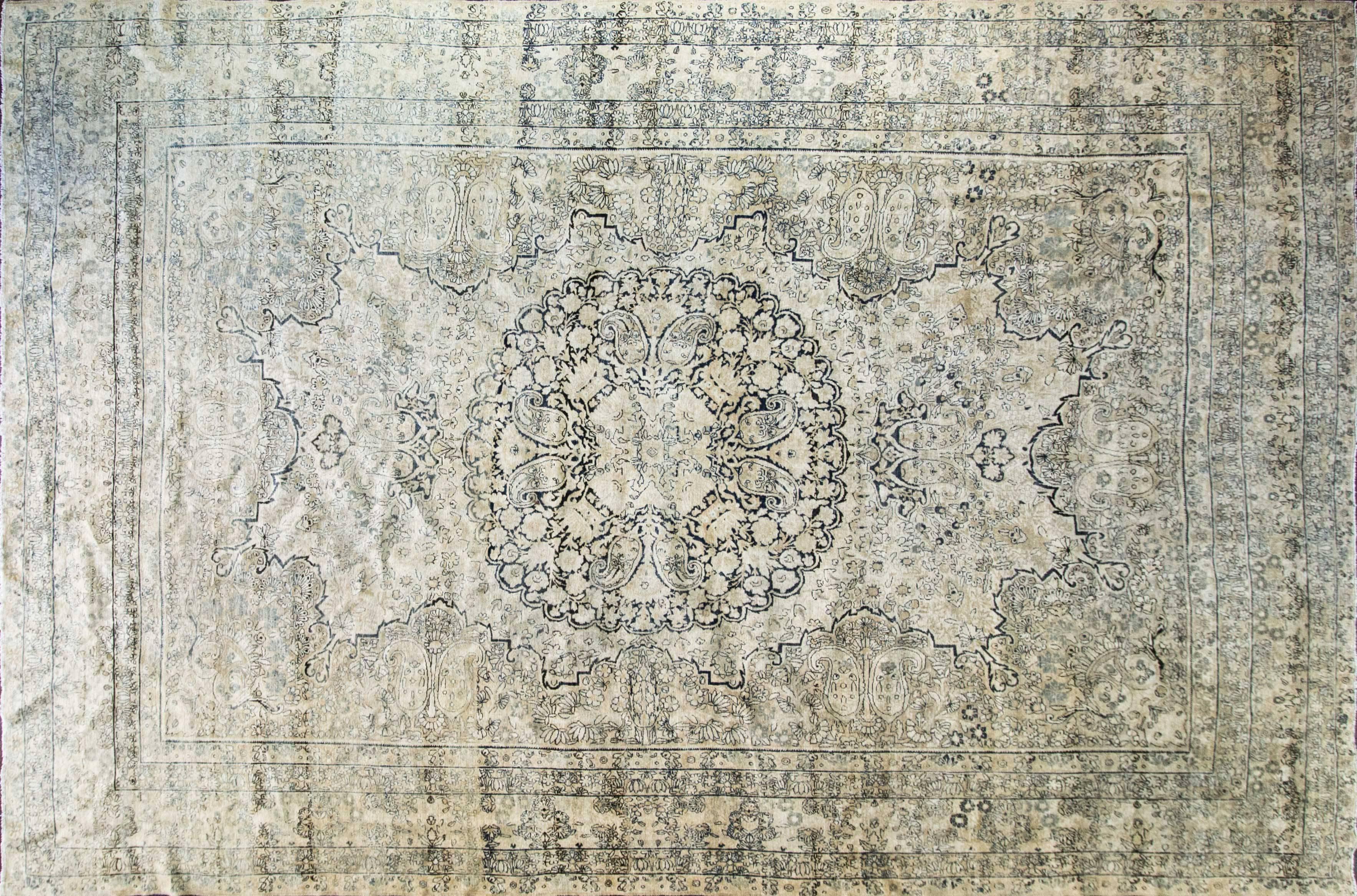 Kirman was a very important antique rug weaving centre dating from the Golden Age of Persian culture under the Safavid dynasty in the 16th century, on a par with Tabriz and Kashan in esteem. The color palette of Laver Kirman antique Persian rugs is