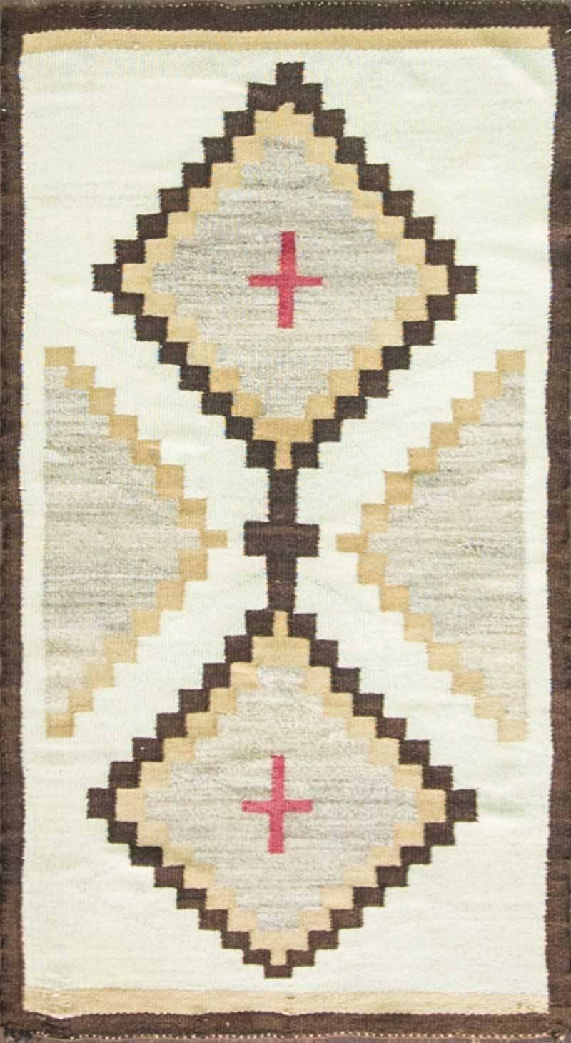 Navajo regional rug,
circa 1910, Navajo regional rug in brown,beige, tan, and red.
Measure: 31-1/4