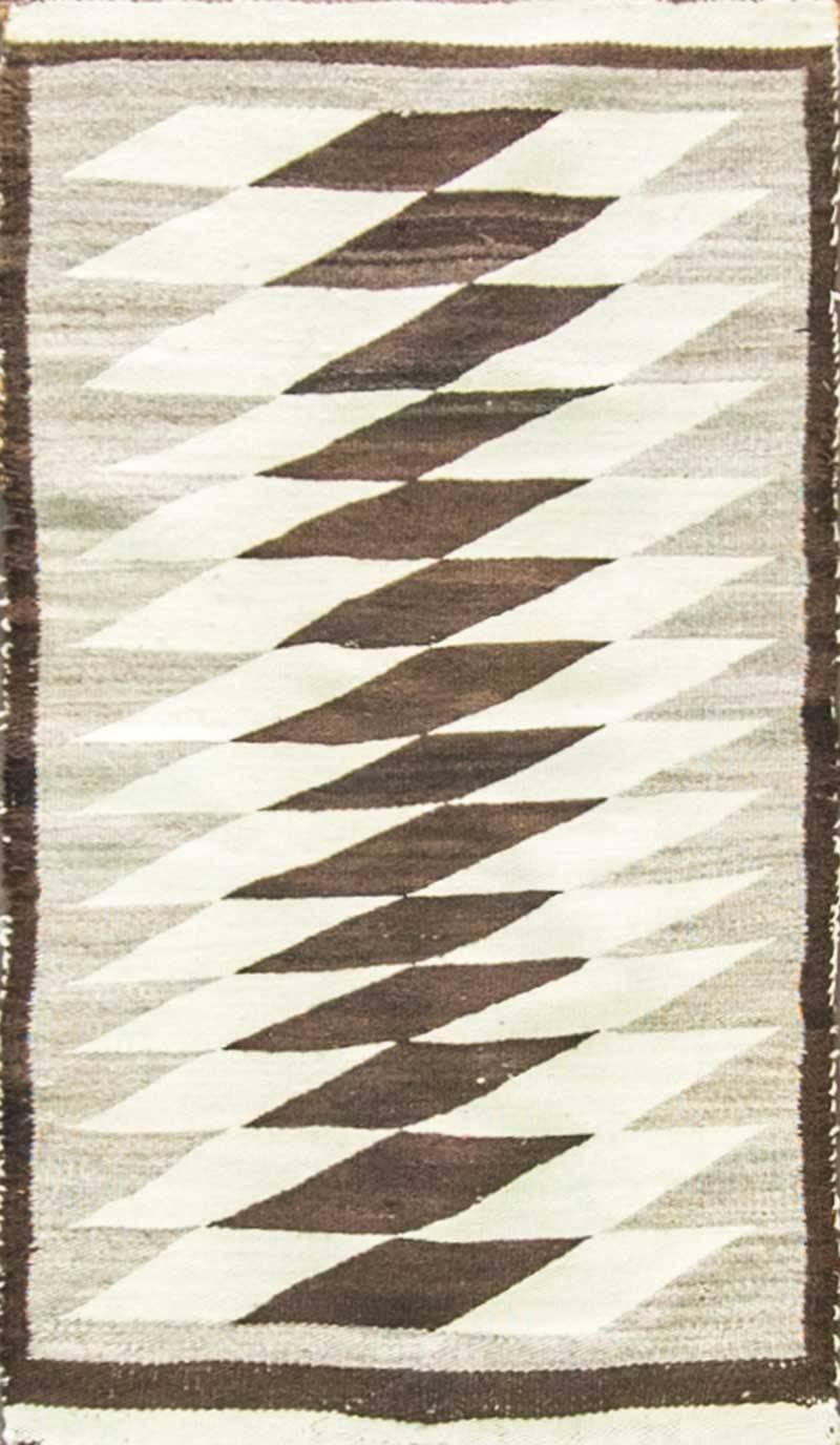 A typical Navajo rug has approximately 30 wefts to the linear inch. A Two Grey Hills from Toadlena average about 45. The finer pieces frequently have upwards of 80. When a textile has 80 or more wefts per inch, it is considered a tapestry, not a