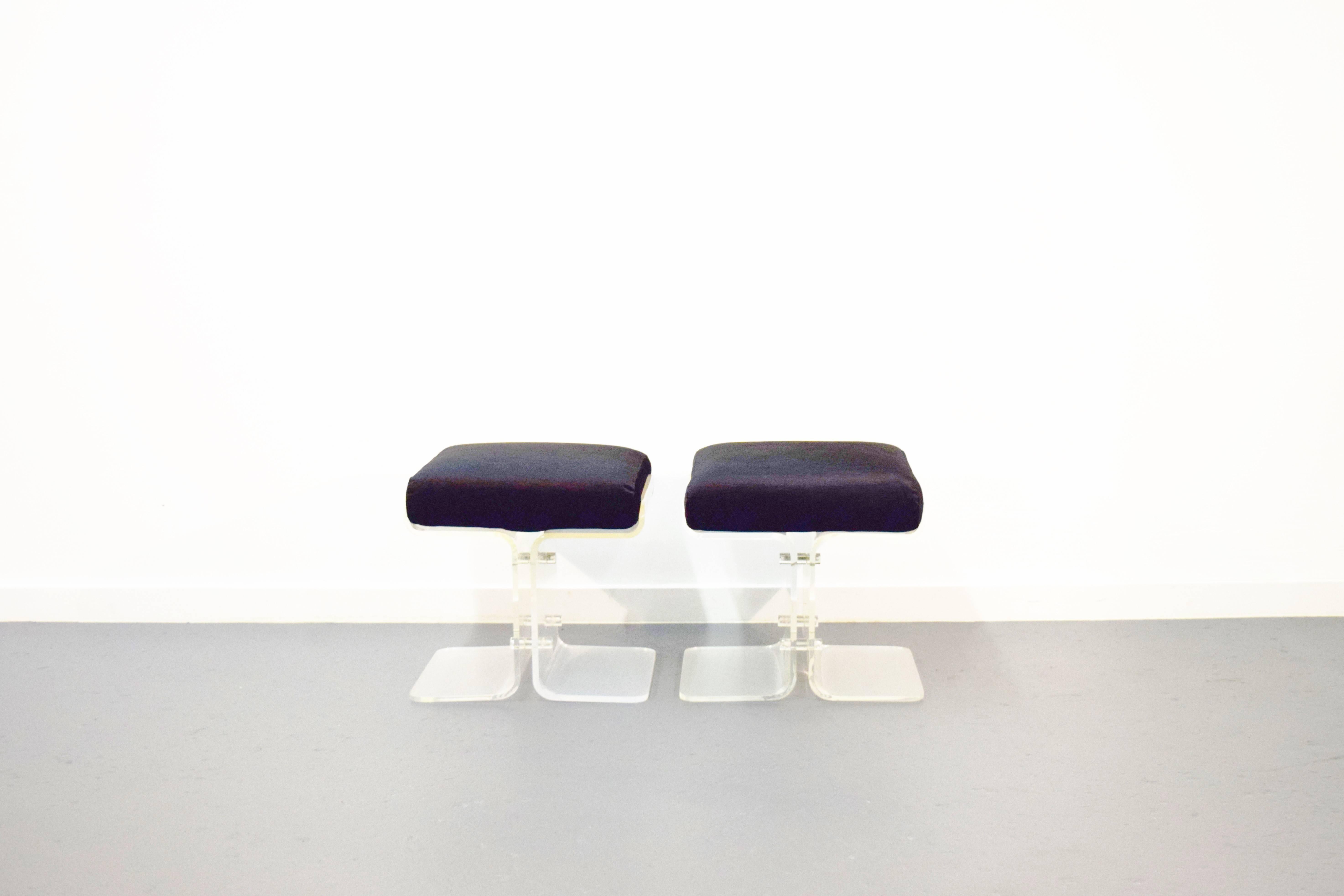 Pair of Lucite butterfly stools. Stools have been reupholstered in black soft velvet.