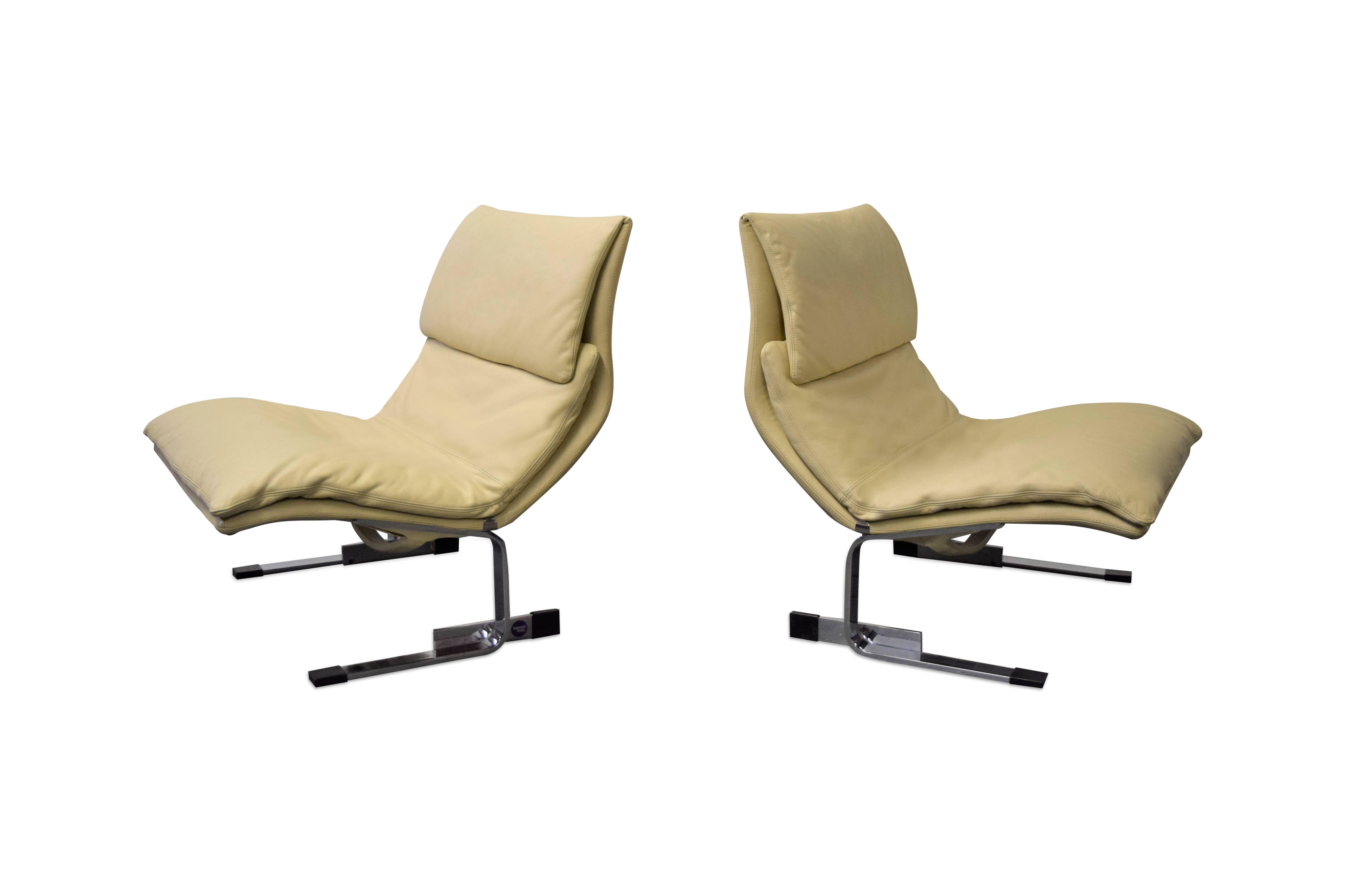 Pair of leather Saporiti 'Onda' wave lounge chairs. Base is signed.