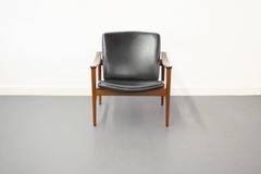Fredrik A. Kayser Rosewood Lounge Chair